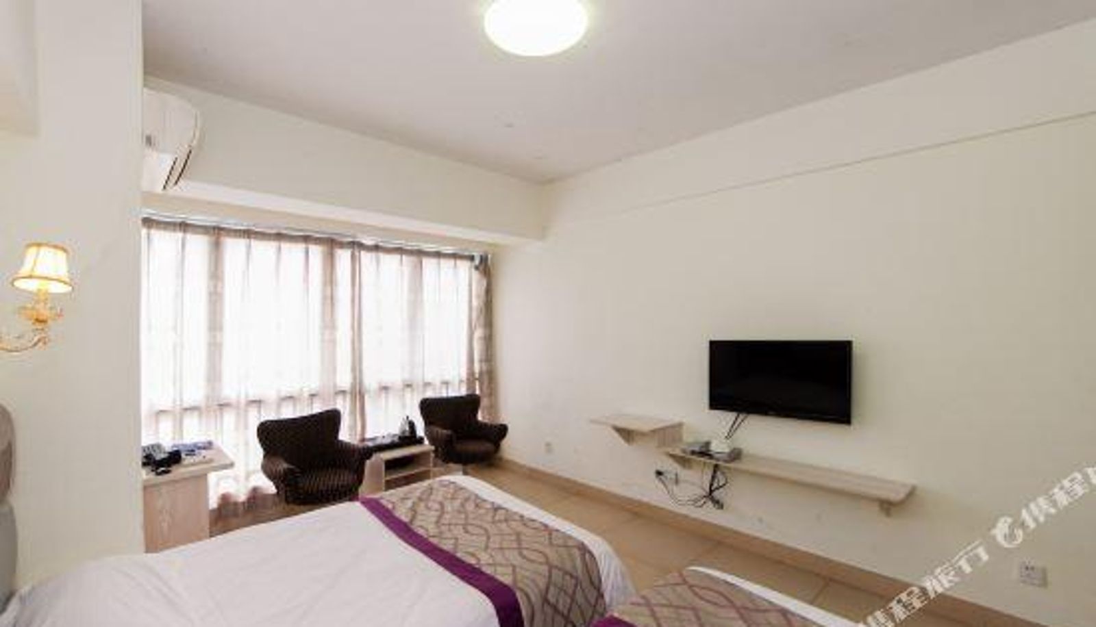 Zimmer - Xinjie Apartment Hotel