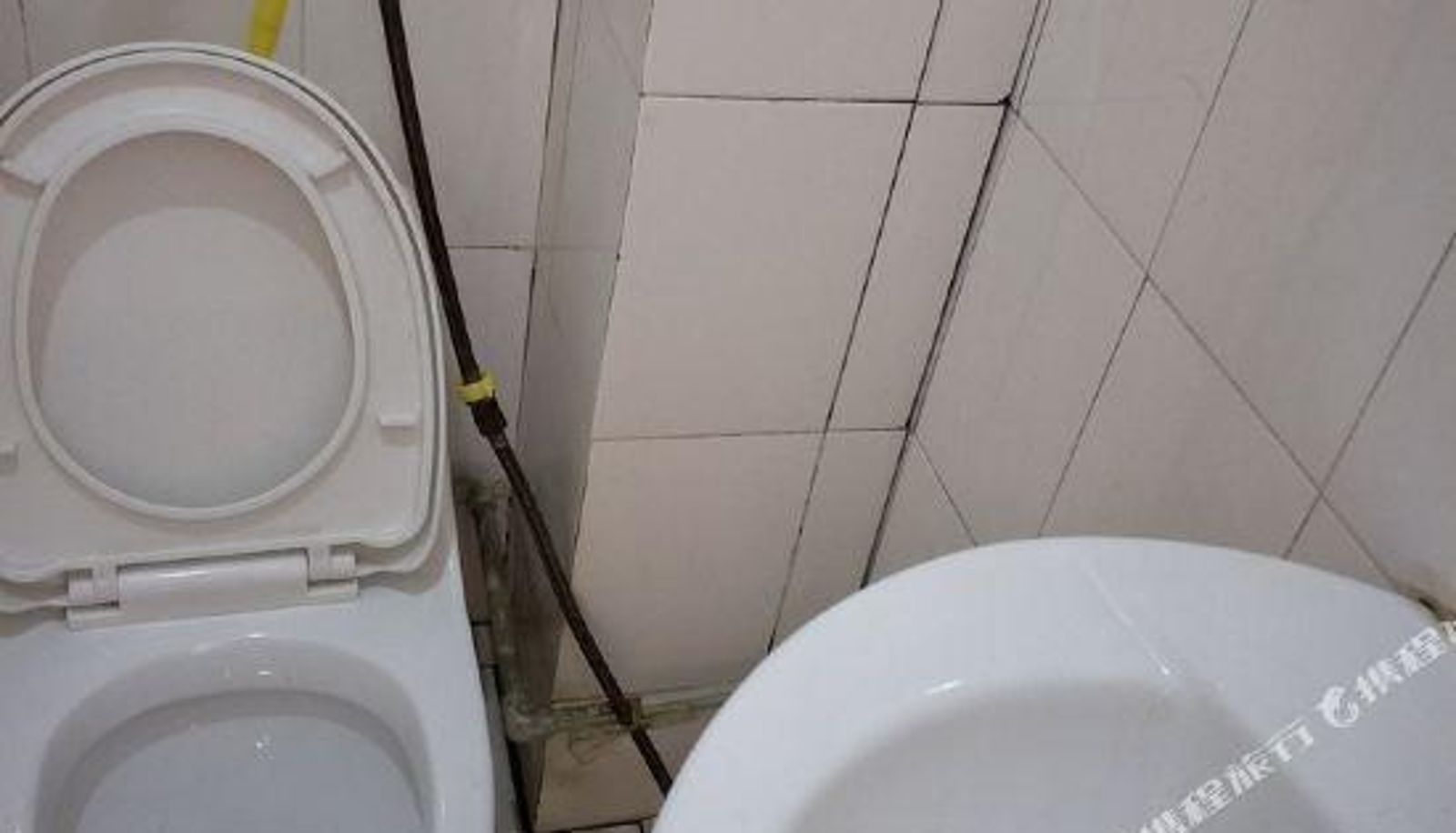Chambre - Qinqin Apartment Hotel