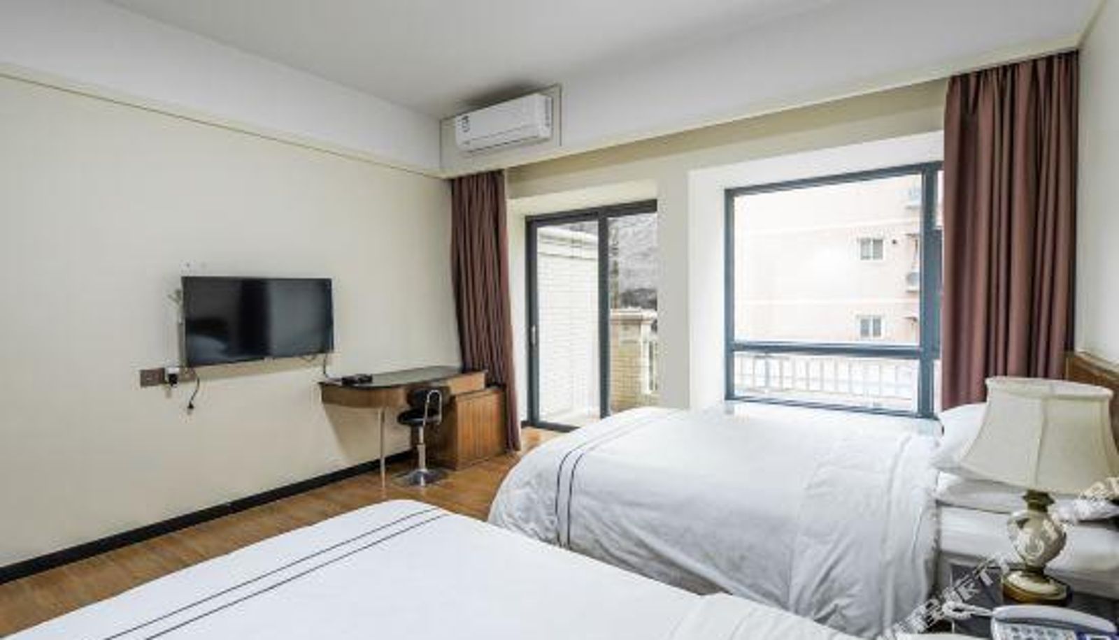 Camera con balcone - Binhai Holiday Apartment
