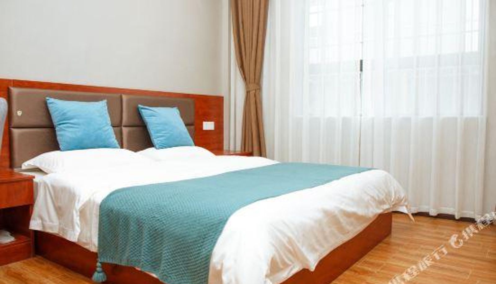 Zimmer - Kaiyue Business Hotel