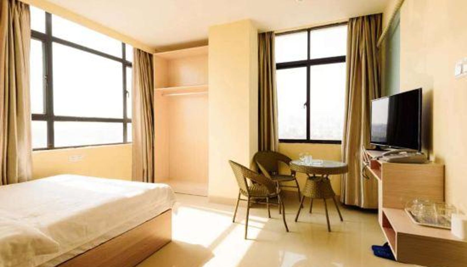 Zimmer - HNA Business Apartment (Zhanjiang Wanda Plaza Store)
