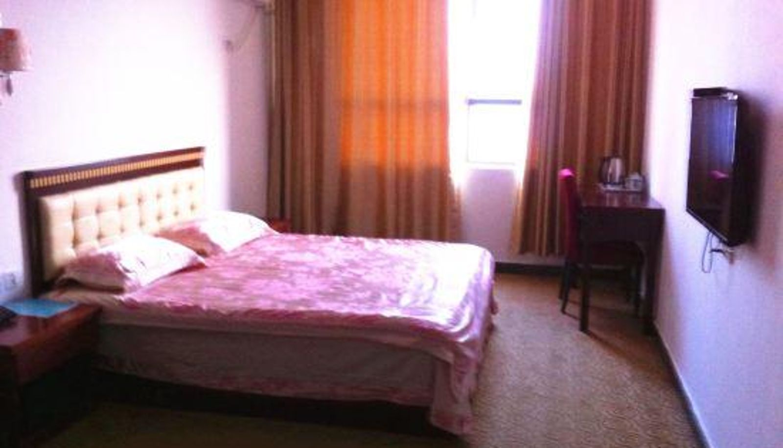 Zimmer - Xinyang Zhuangjiayuan Hotel