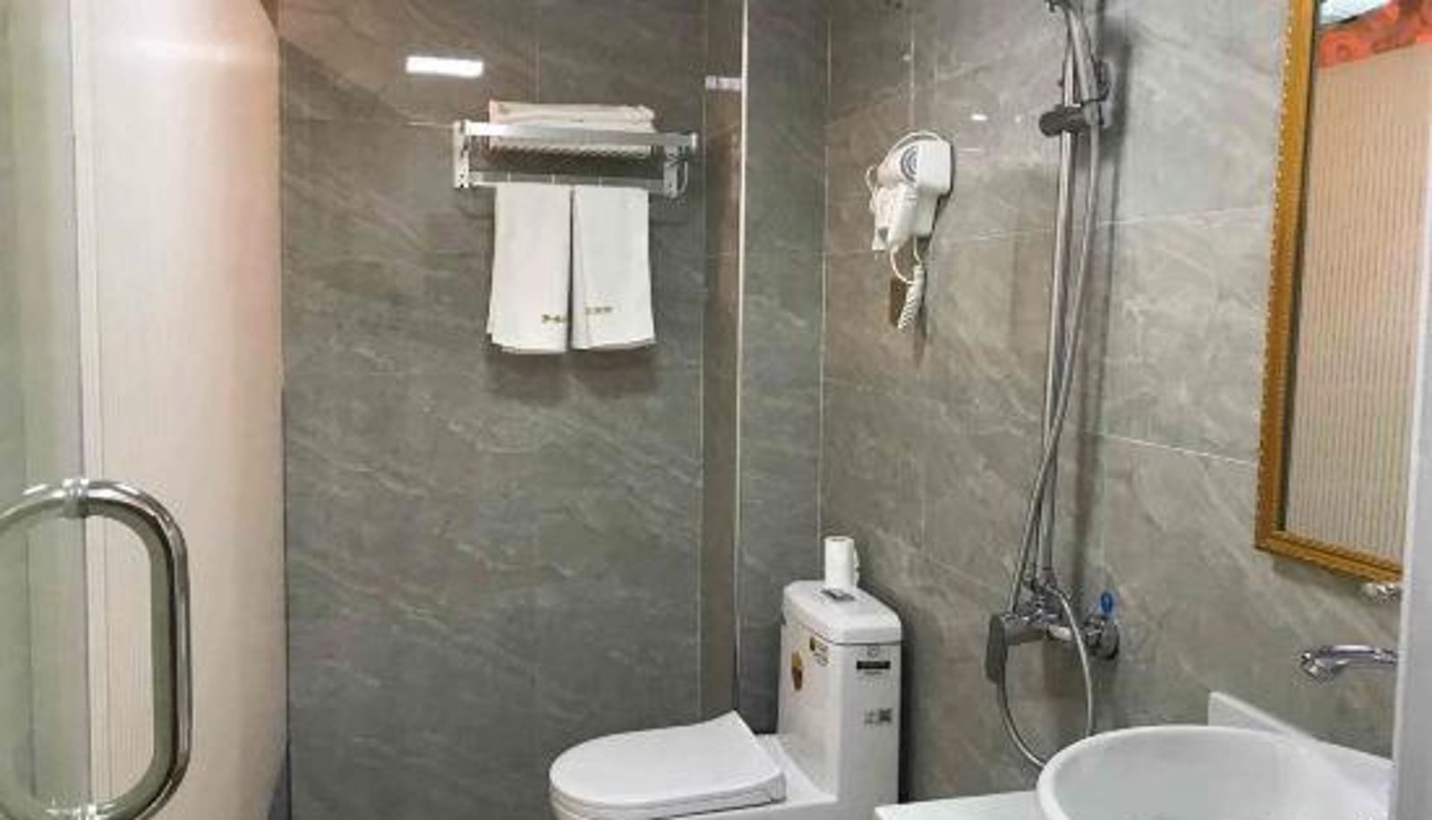 Zimmer - Mengyuan Boutique Hotel (Wuhan Zuoling New City Future Third Road Subway Station Store)