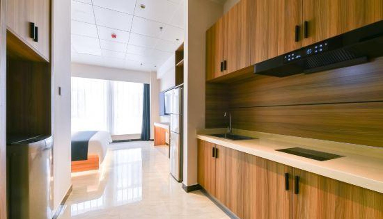 Zimmer - Eiffel Almighty Hotel (Shijiazhuang Station Ximeihua Street)