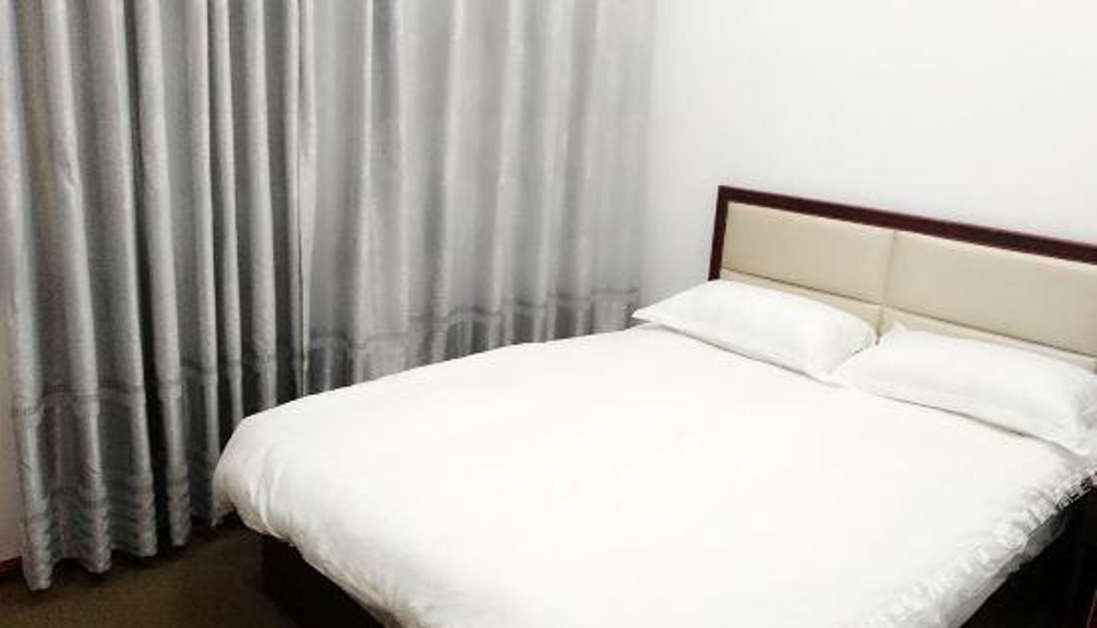 Zimmer - Nanyang Meijie Hotel