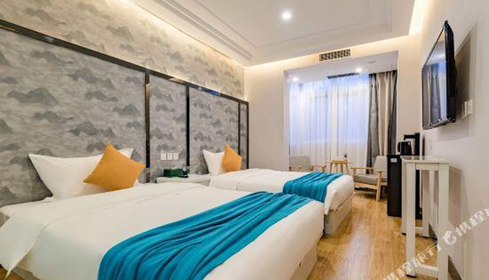 Zimmer - Yuandian Hotel (Luoyang Railway Station Zhouwangcheng Square Subway Station)