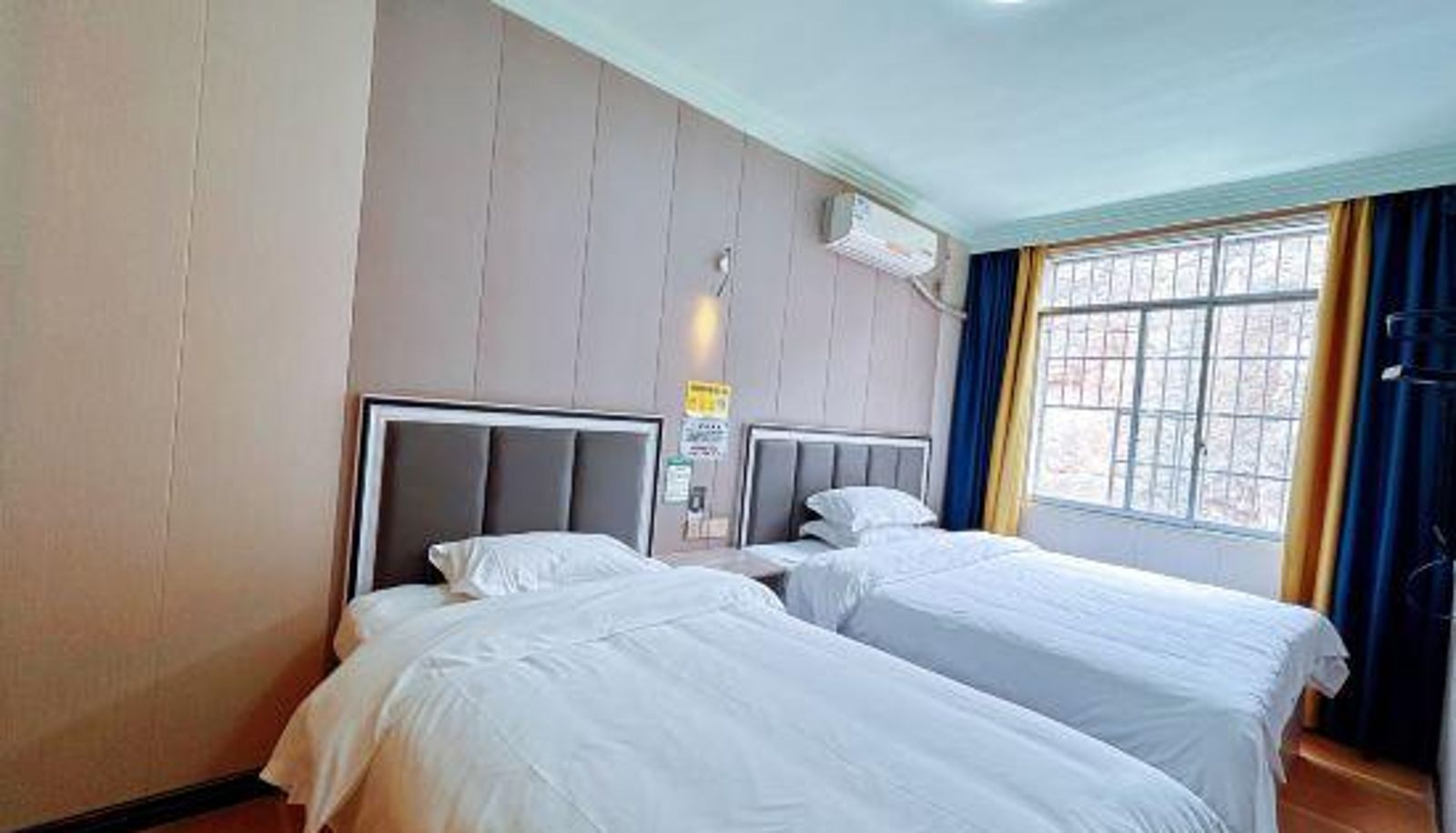 Habitación familiar - Kaili Wanbing Haokaya Hotel (Guizhou Electronic Information College)