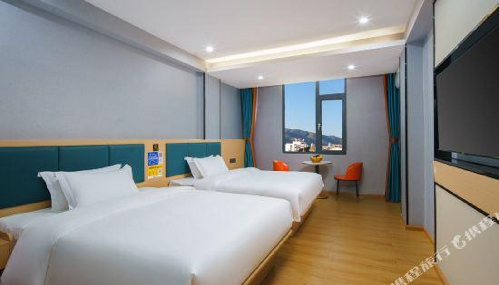 Zimmer - Xinyue Hotel (Baoshan Yongchang Road Branch)