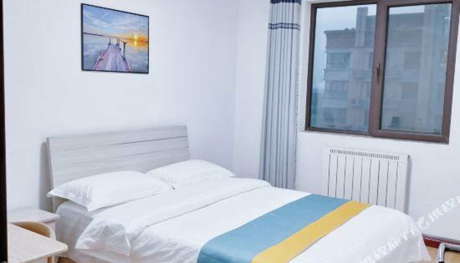 Zimmer - Chengyue Apartment (Jinan East High-speed Railway Station)