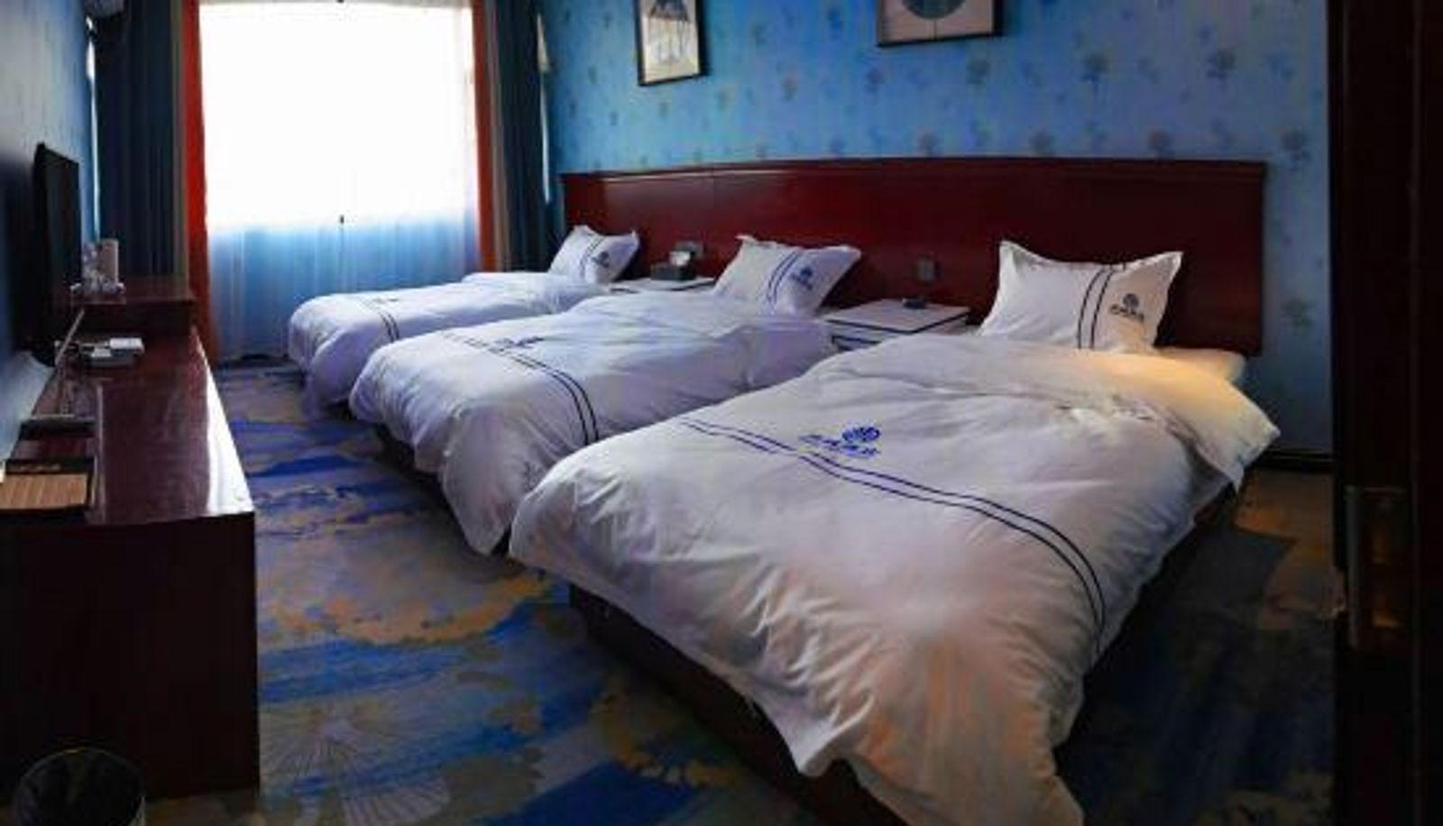 Habitación - Shangcheng Theme Hotel (Dali Railway Station)
