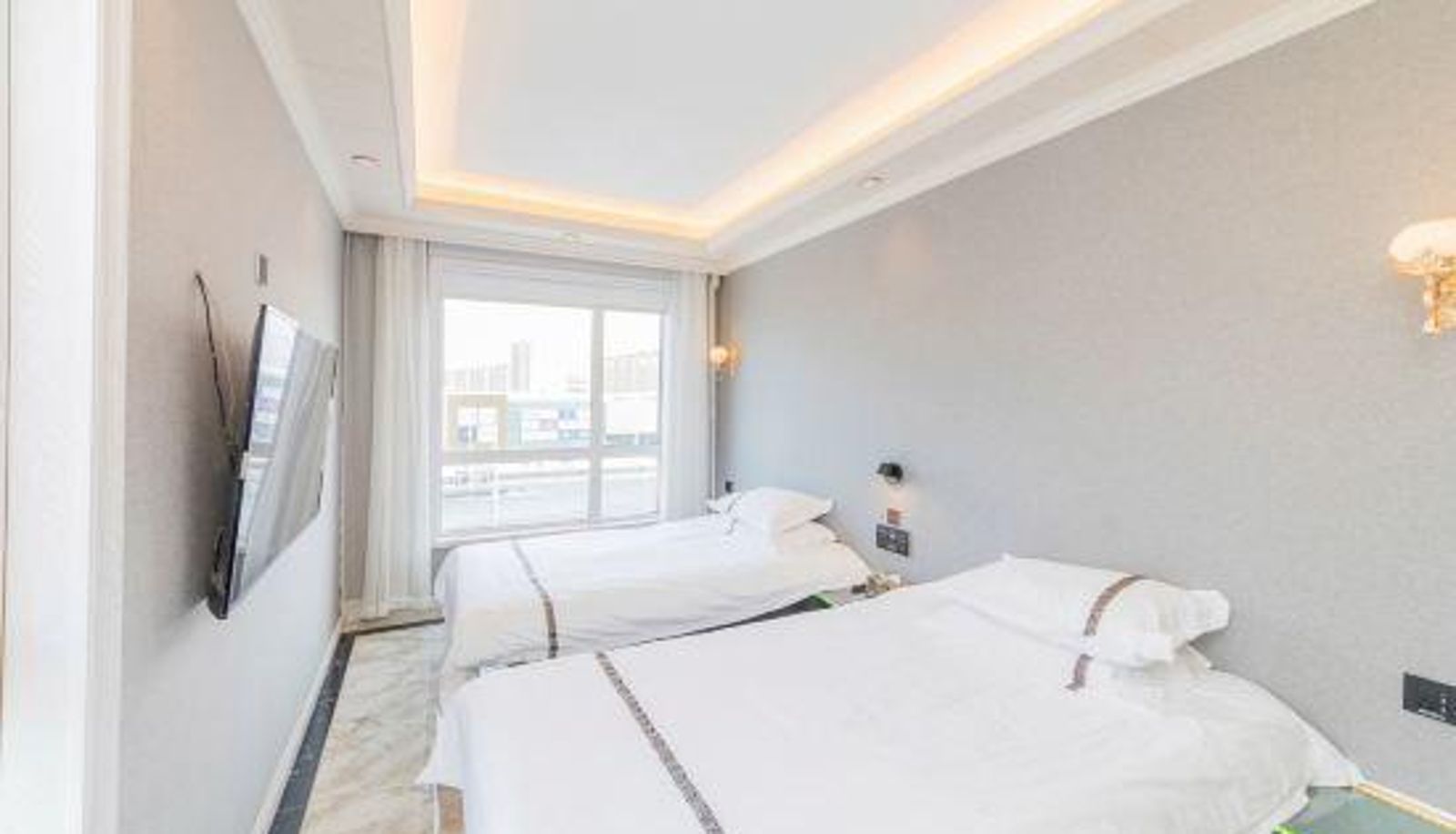 Habitación familiar - Harbin Haiyun Hotel