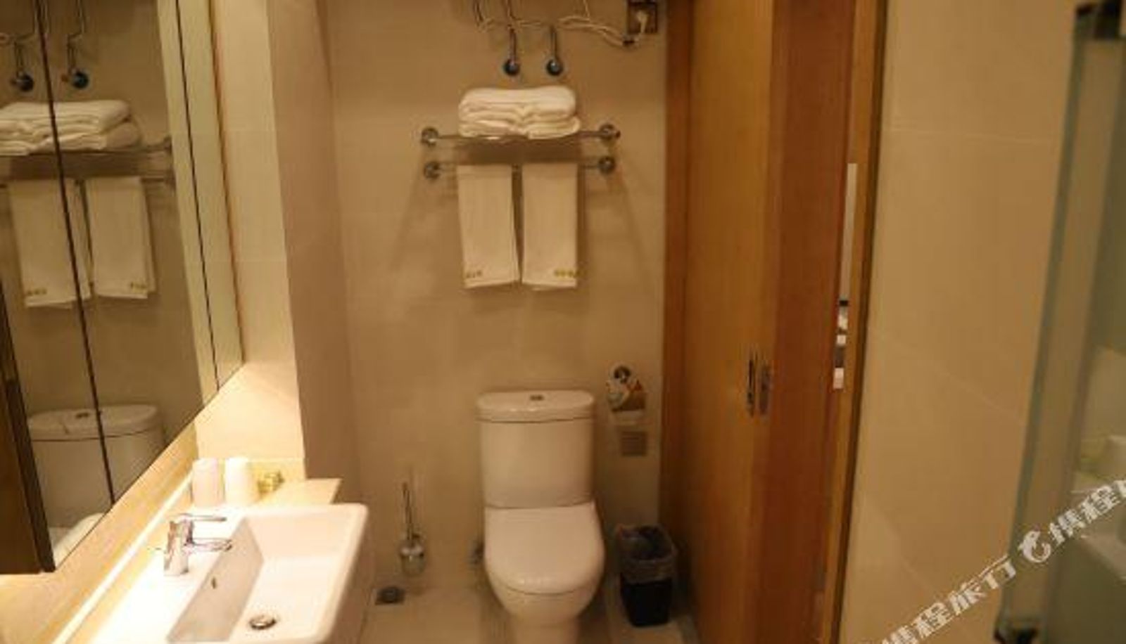 Zimmer - Qingdao Nuoxuan Boutique Apartment (China Railway Expo City Store)