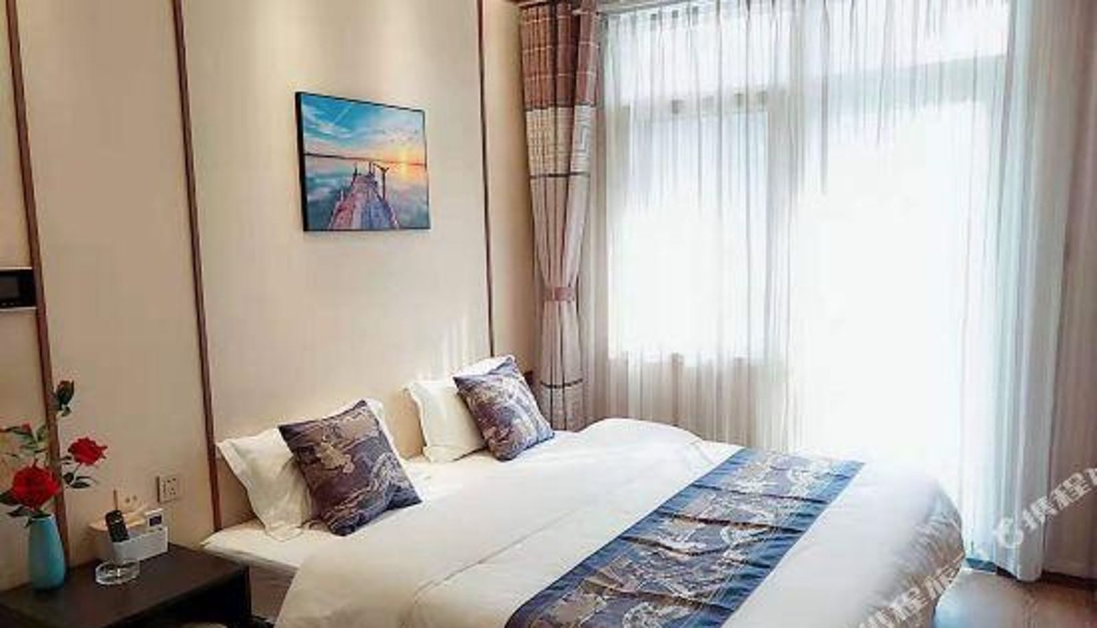 Habitación con balcón - Huangjiaxuan Holiday Apartment (Qingdao China Railway Expo City)
