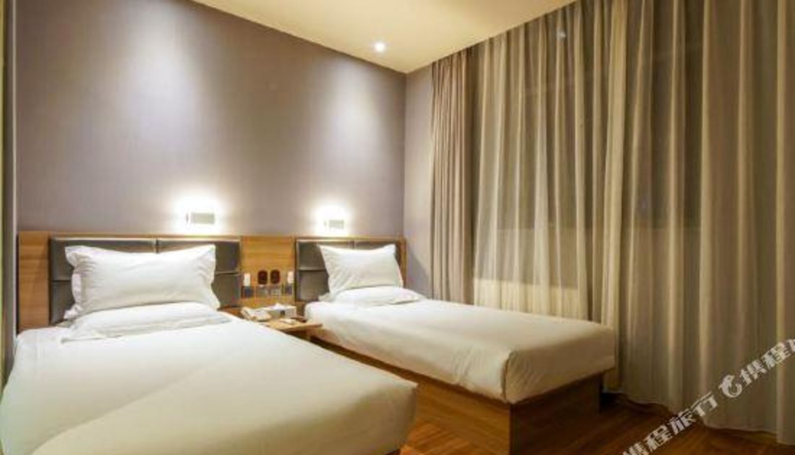 Zimmer - Huayi Premium Hotel (Beijing Wukesong 301 Hospital)