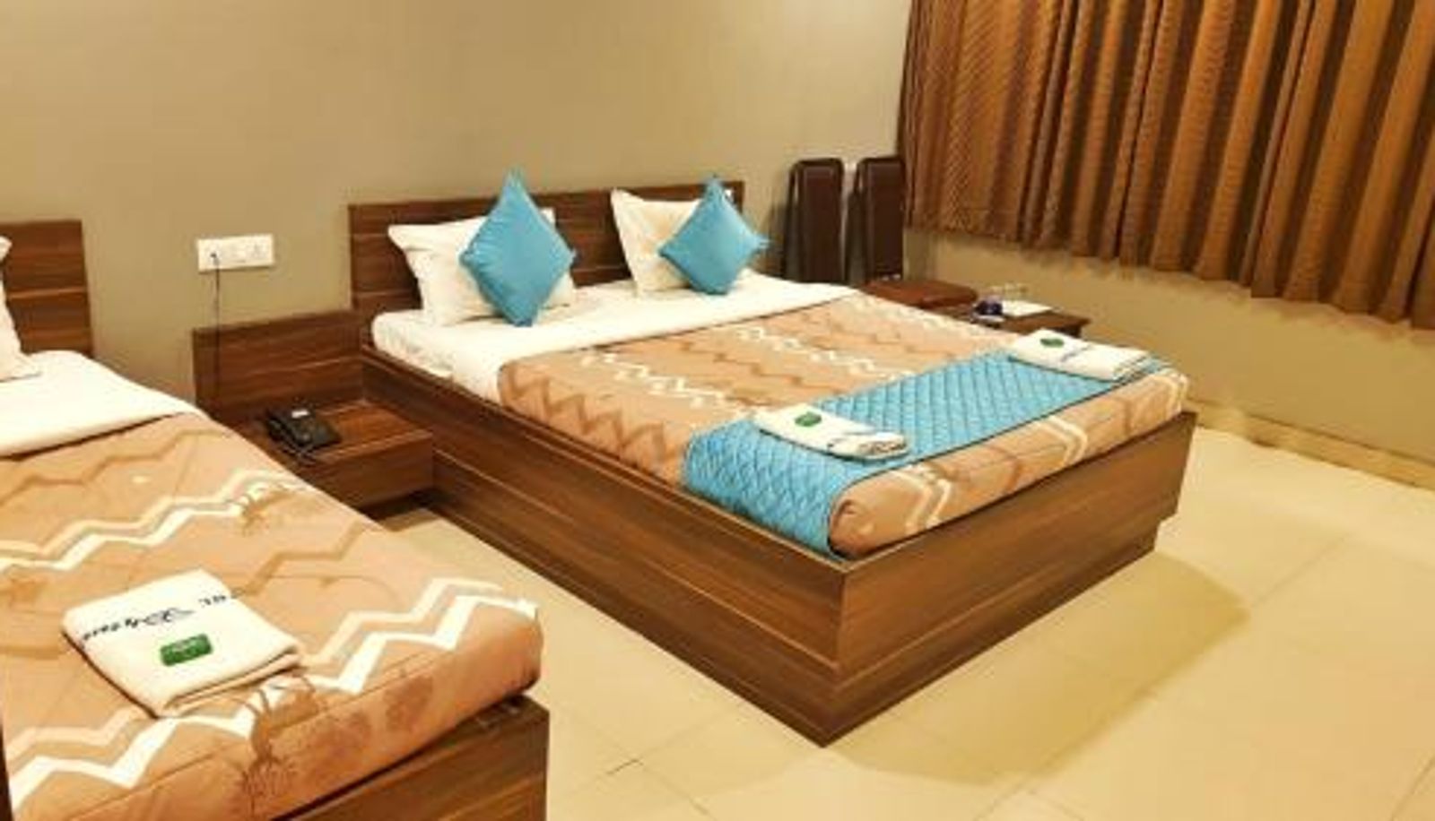 Driepersoonskamer - Hotel Dhruva-Solapur Pet friendly
