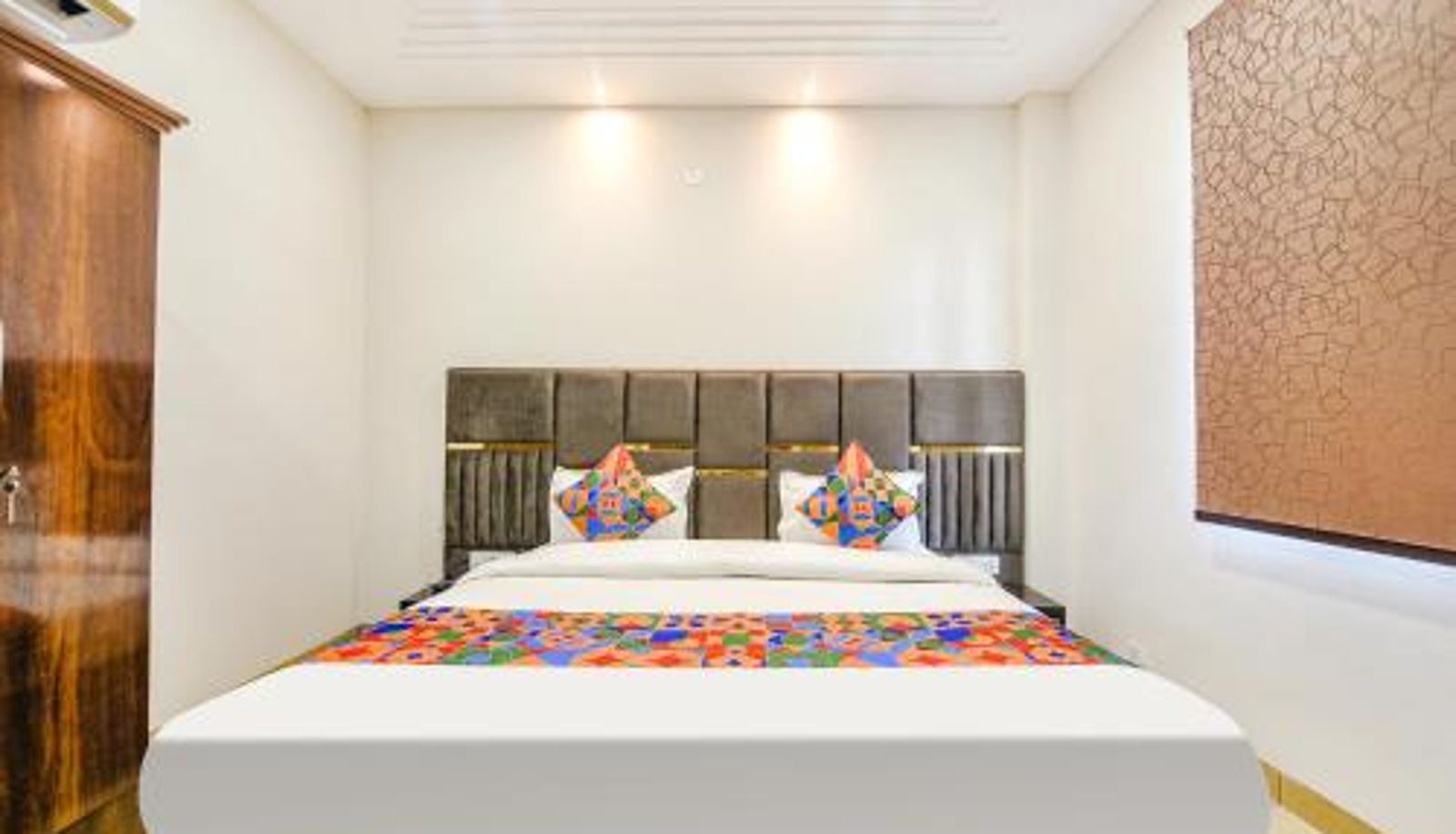 Info - FabHotel Globe Inn