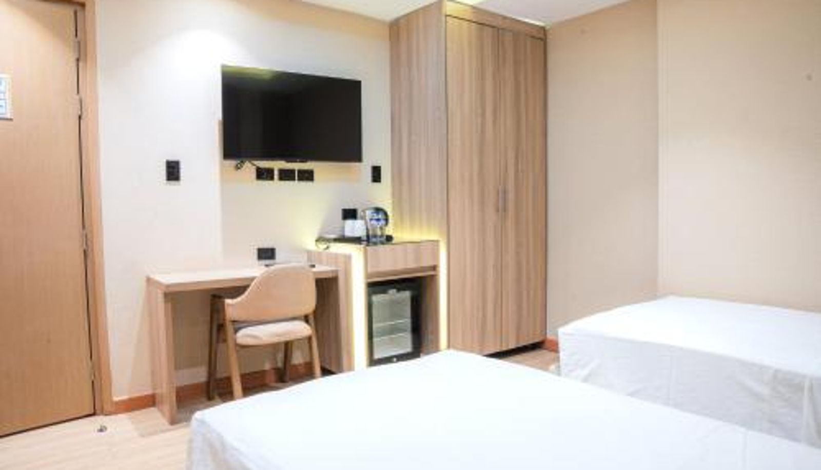 Dreibettzimmer - Sunday Belajandro Hotel