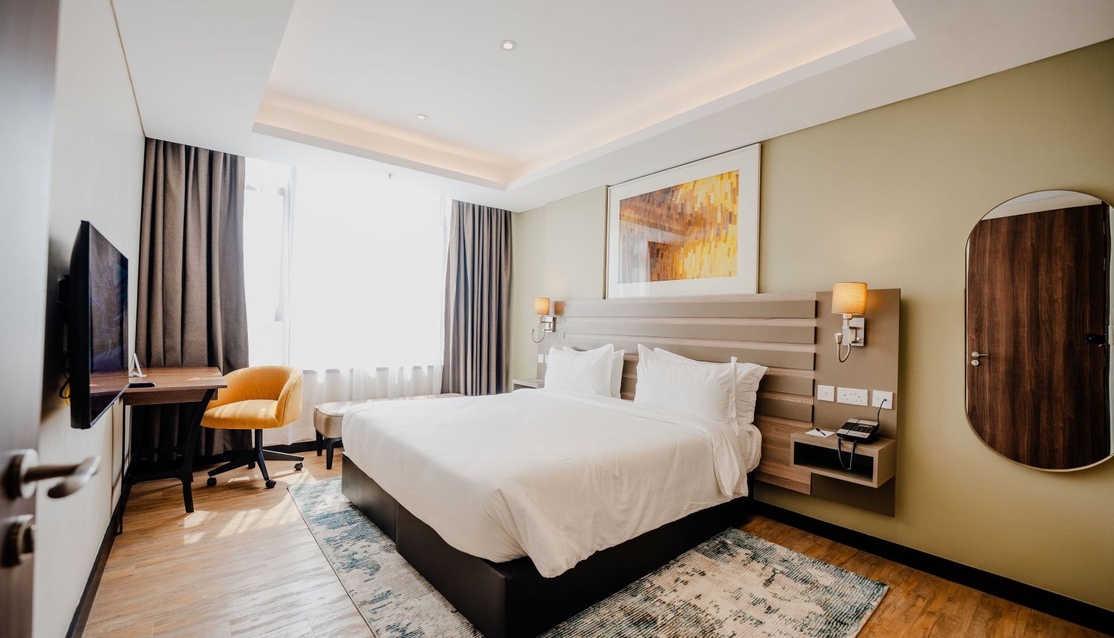 Room - Trademark Suites at Enaki Town