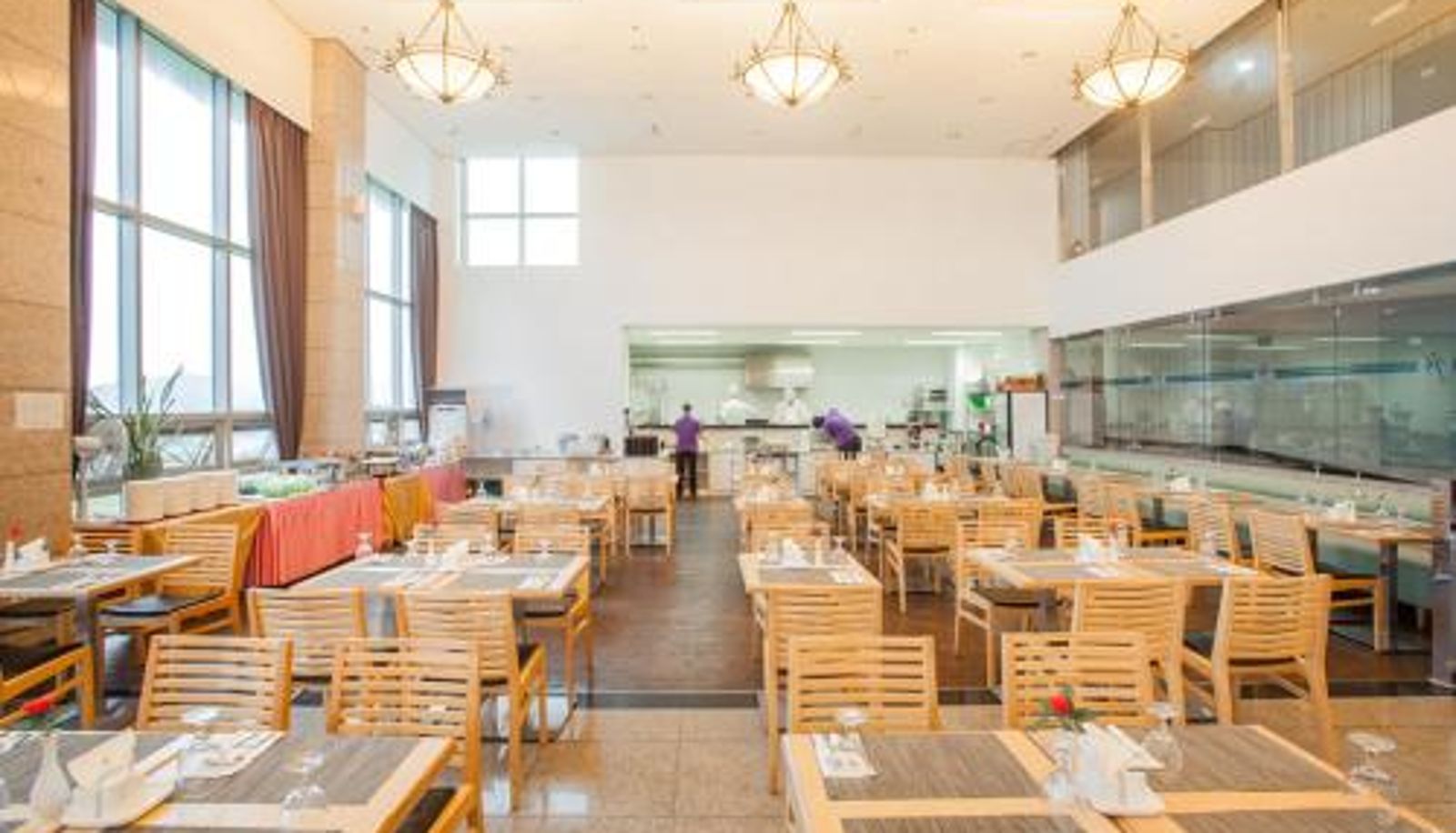 Salle de petit-déjeuner dans le restaurant - Jeju Ilsung Beach Condo