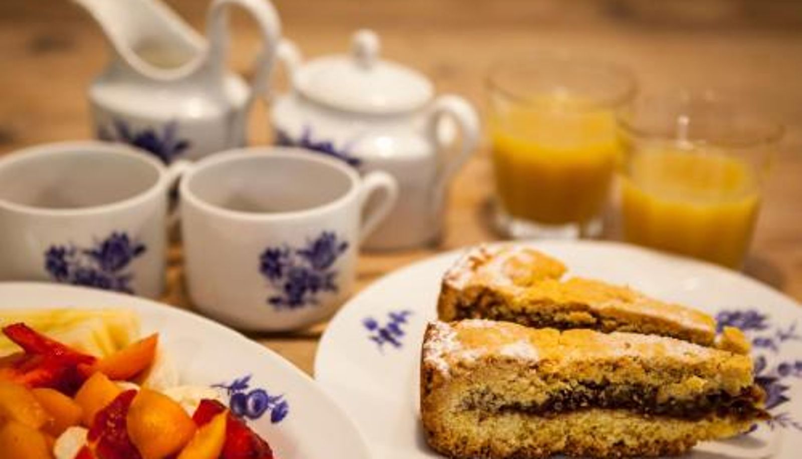 Salle de petit-déjeuner dans le restaurant - Bacialupo Foresteria