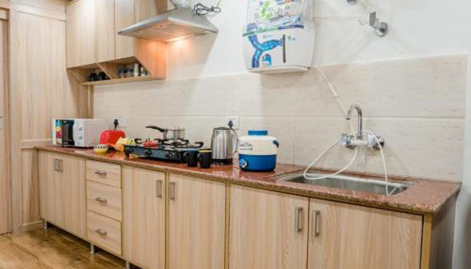 Kuchnia - Wind 2BHK By Wabi Sabi Stays Private Balcony