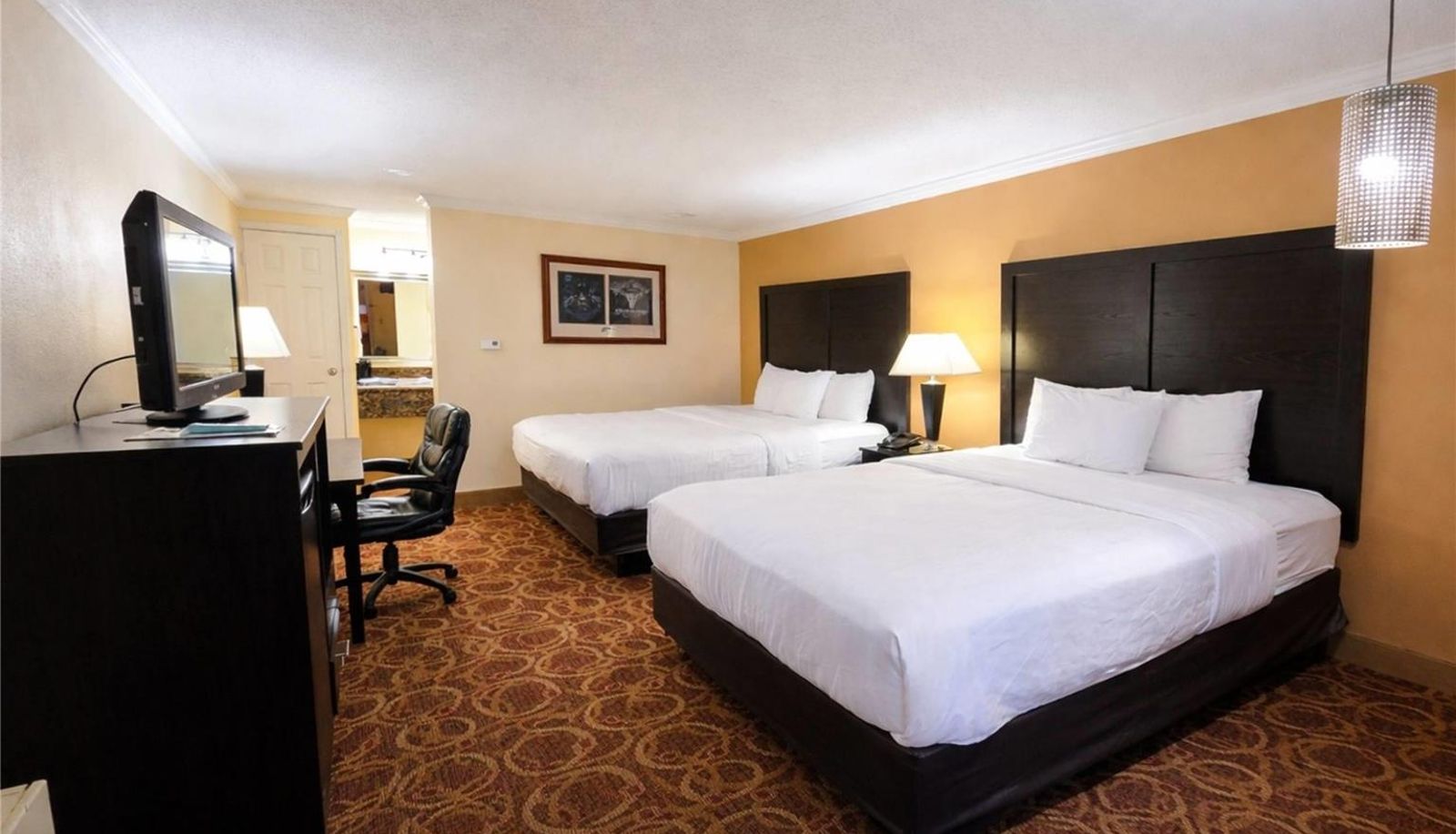 Room - Travelodge by Wyndham Sturgis Lodge & Suites