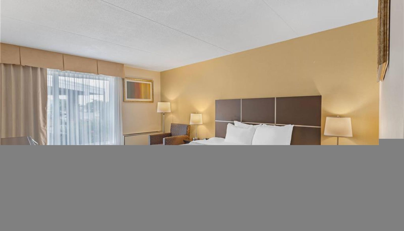 Zimmer - Quality Inn & Suites