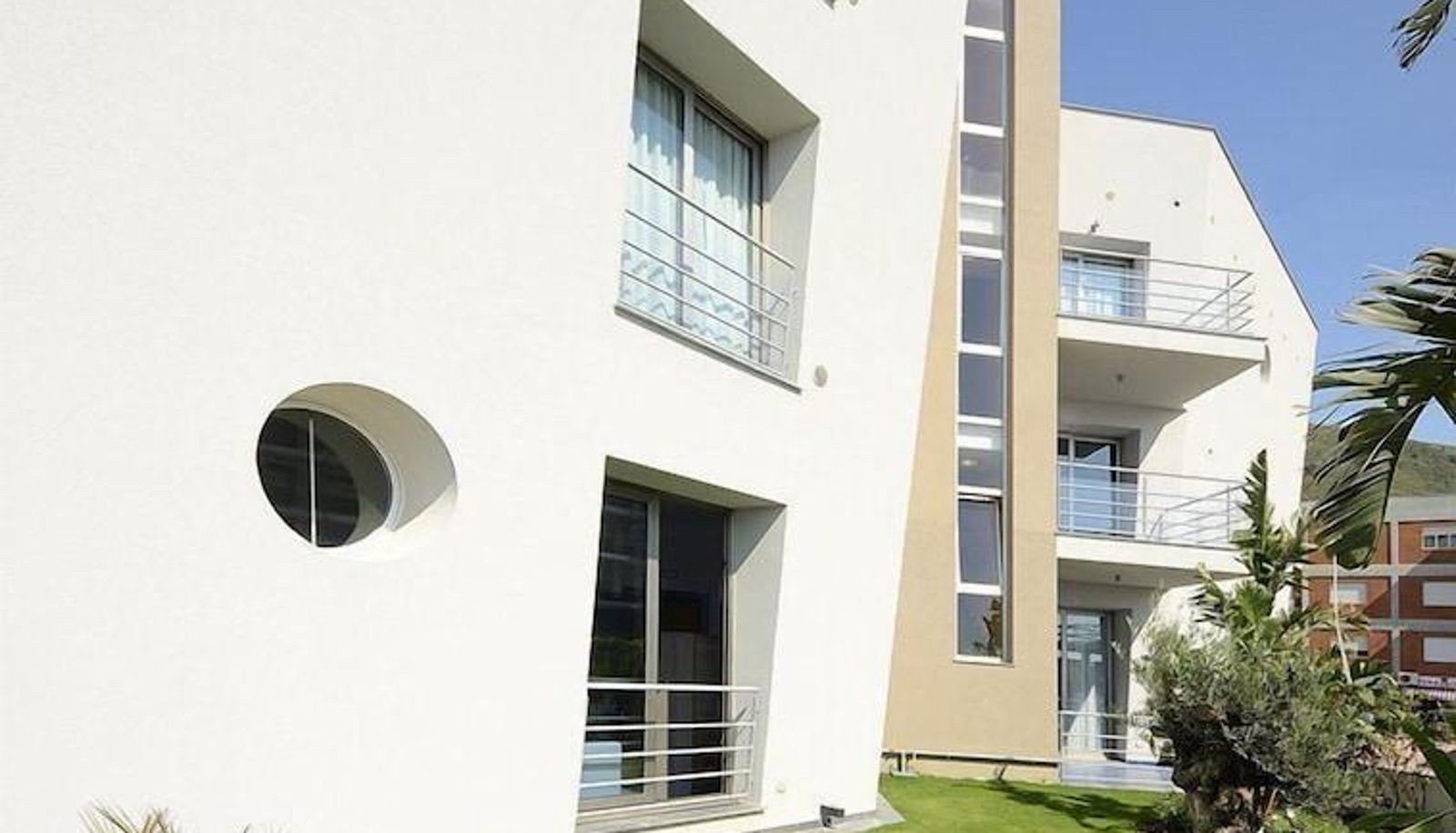Tuin - Astro Suite Hotel