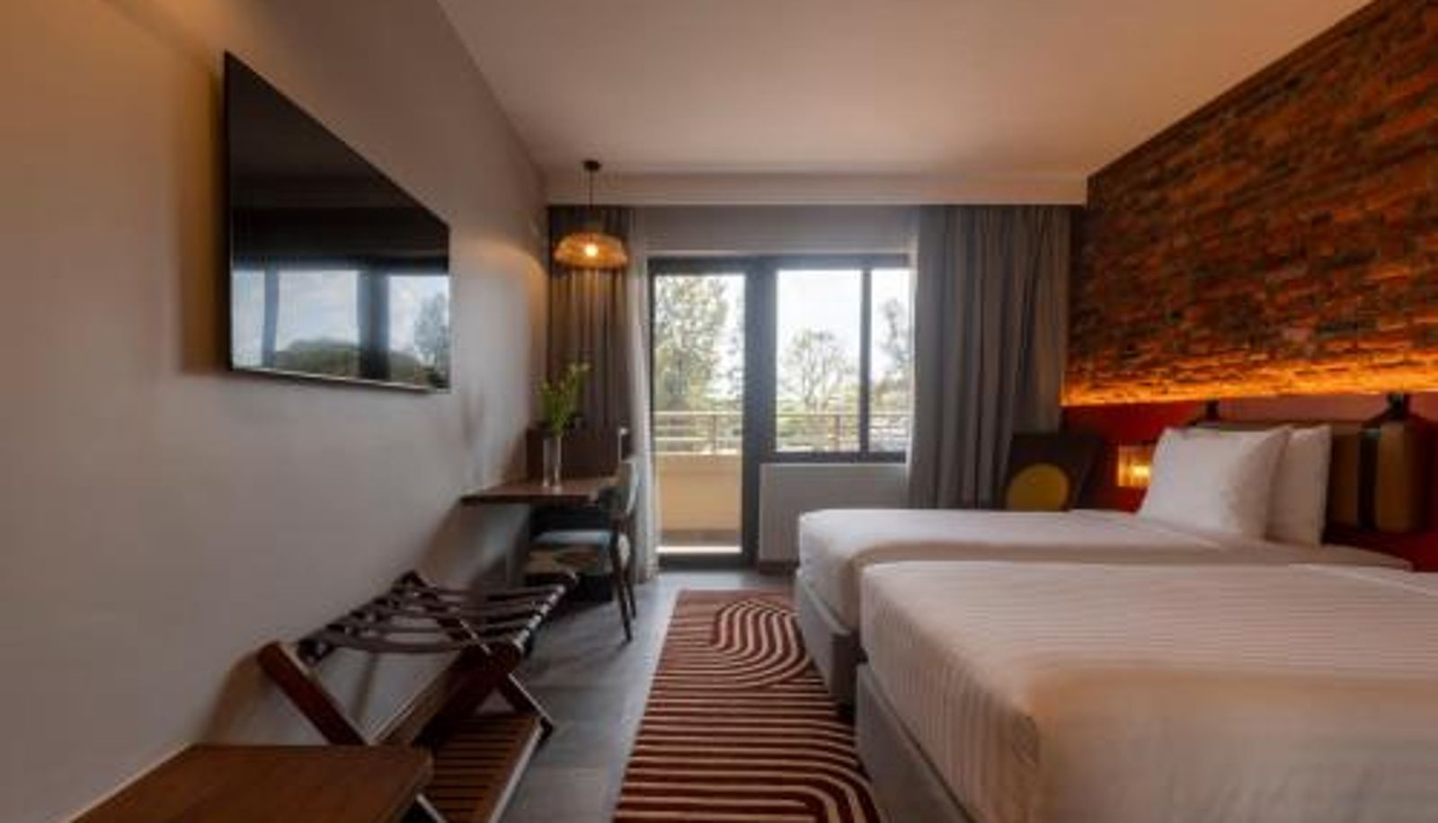 Info - Zaria Court Kigali Tapestry Collection by Hilton