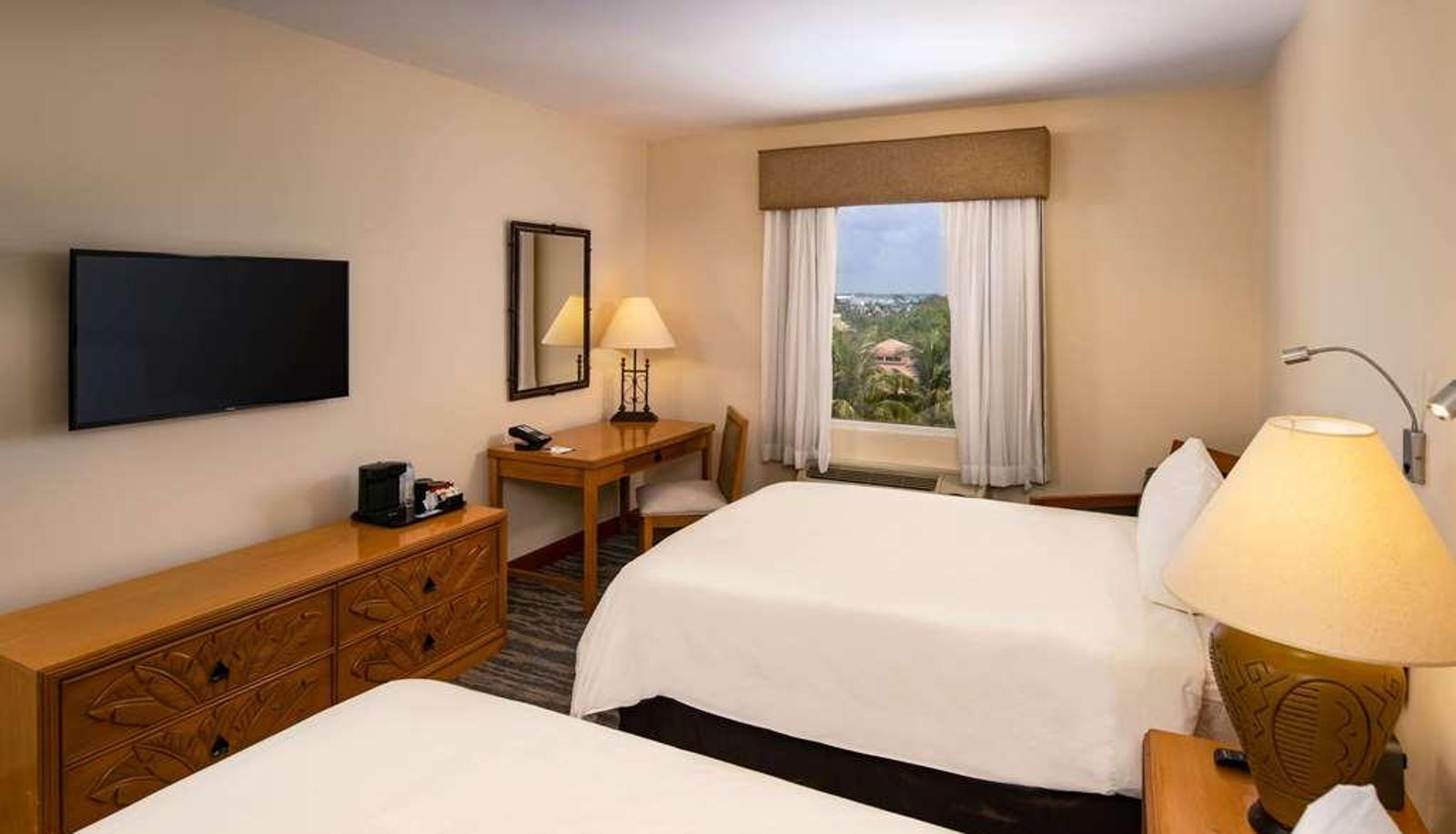 Habitación cuádruple - QUALITY HOTEL REAL AEROPUERTO SANTO DOMI