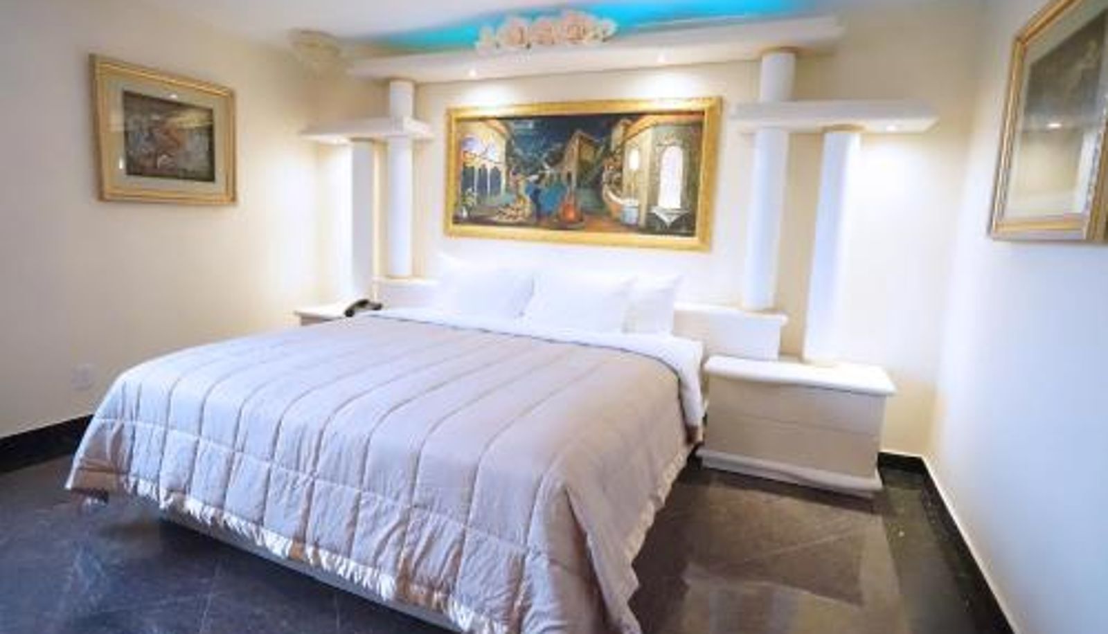 Habitación - Paris Suites Hotel