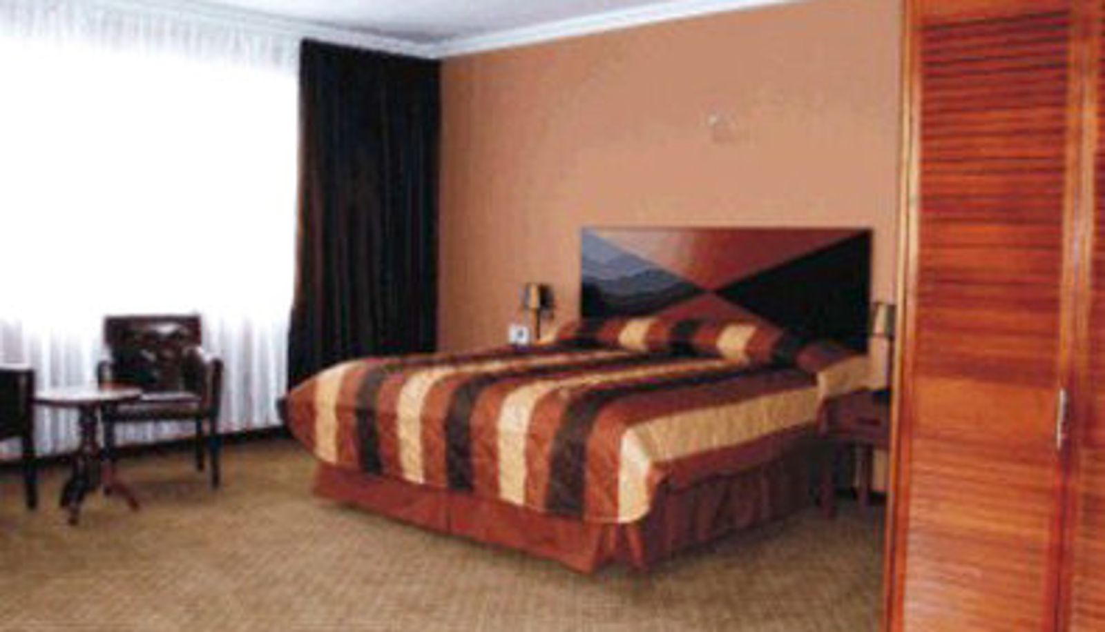 Room - Hotel Elegance N.V.