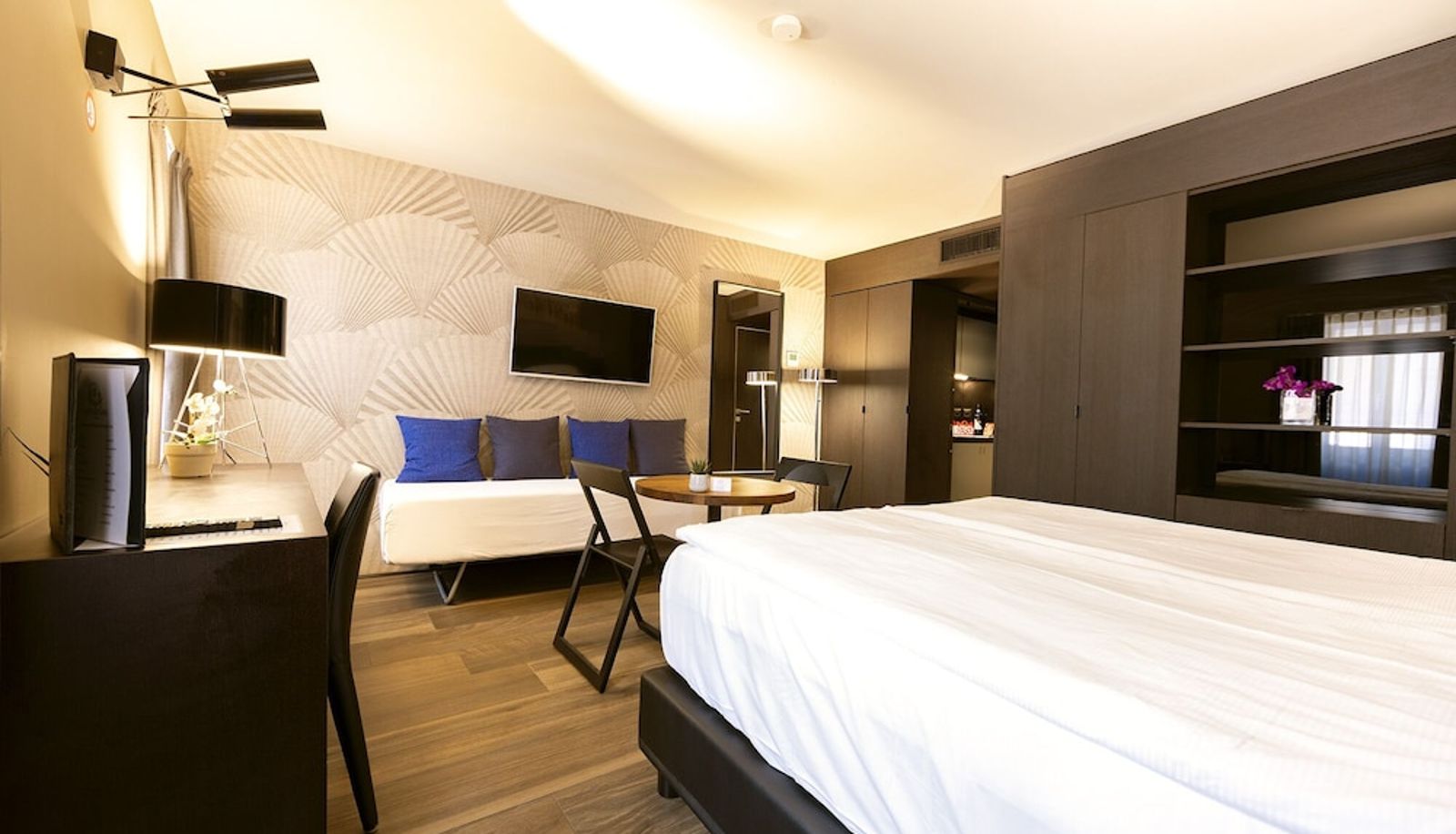 Información - San Carlo Suite Garni