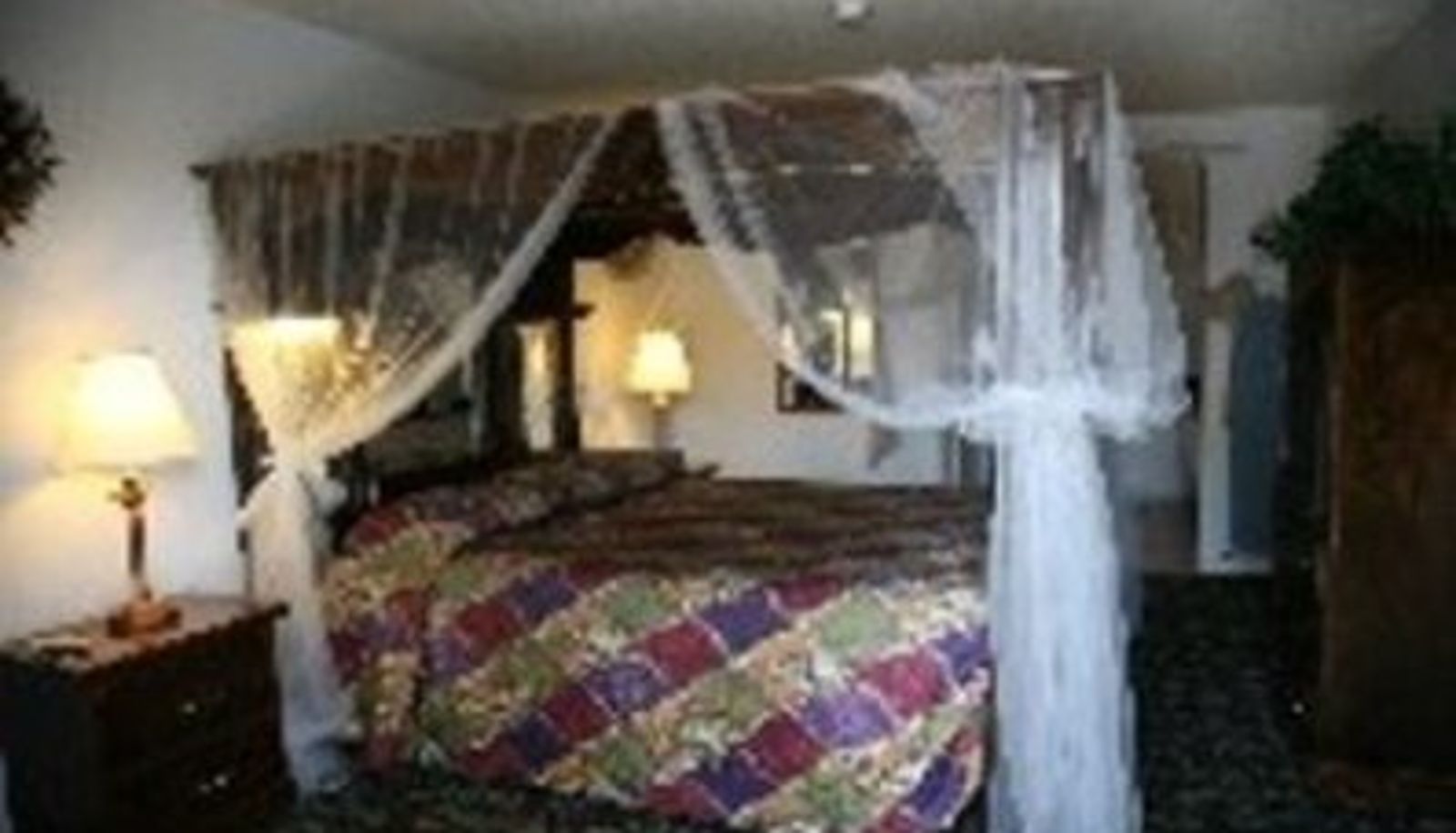 Zimmer - Ambassador Inn and Suites
