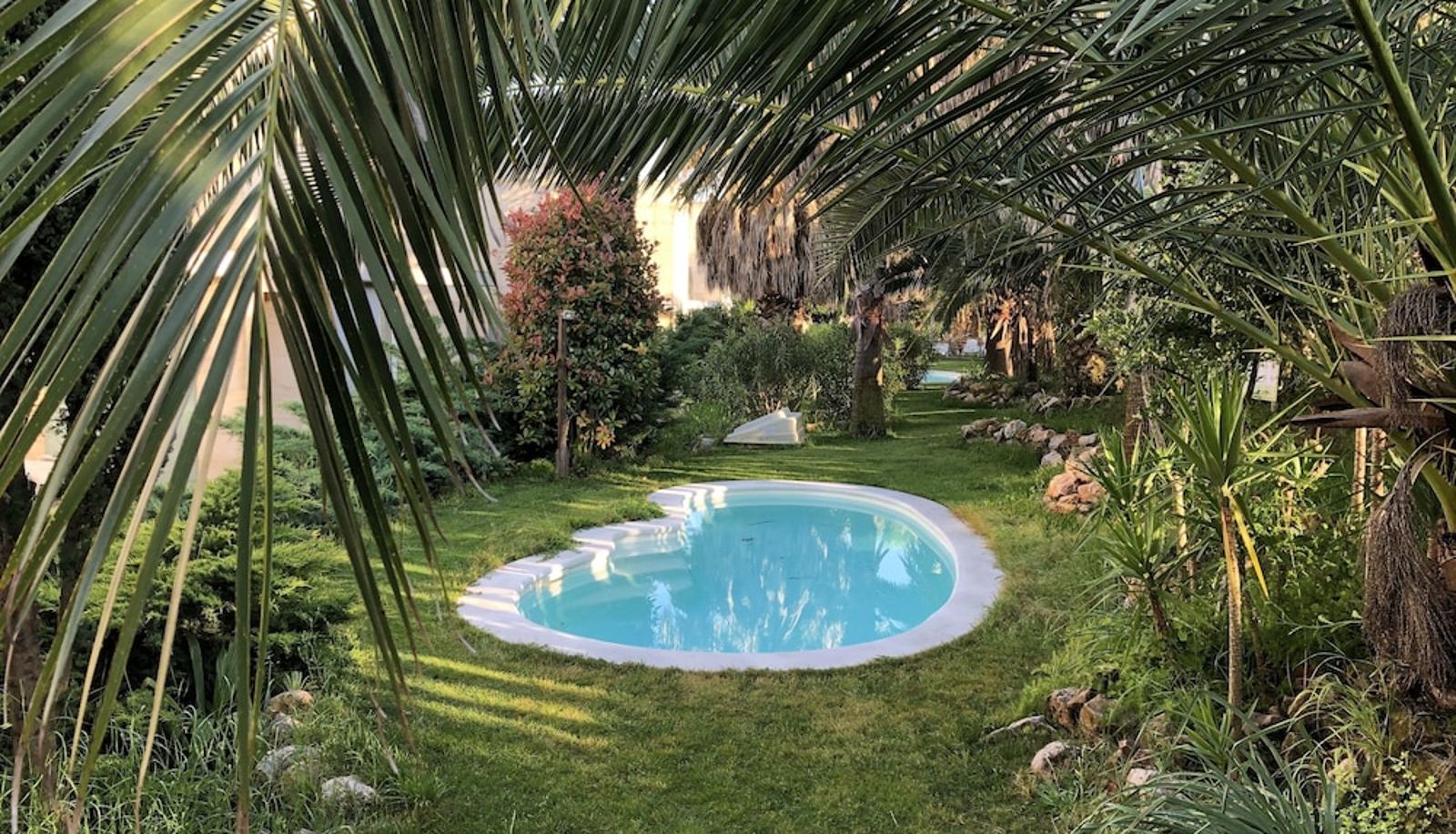 Garten - L'Escala Resort