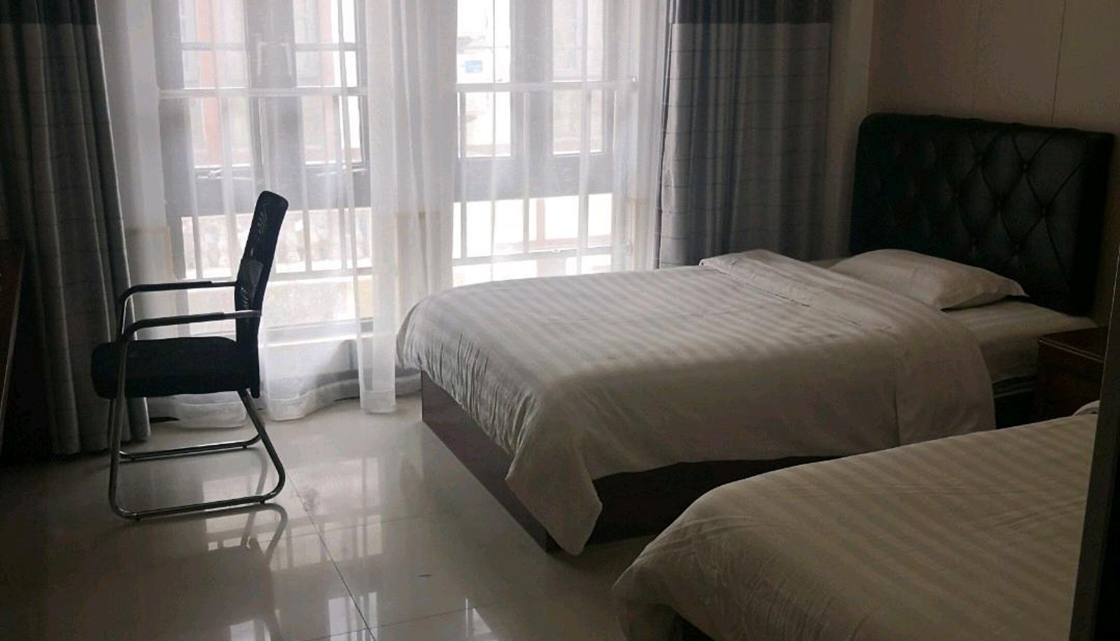 Chambre - Renhe Boutique Hotel