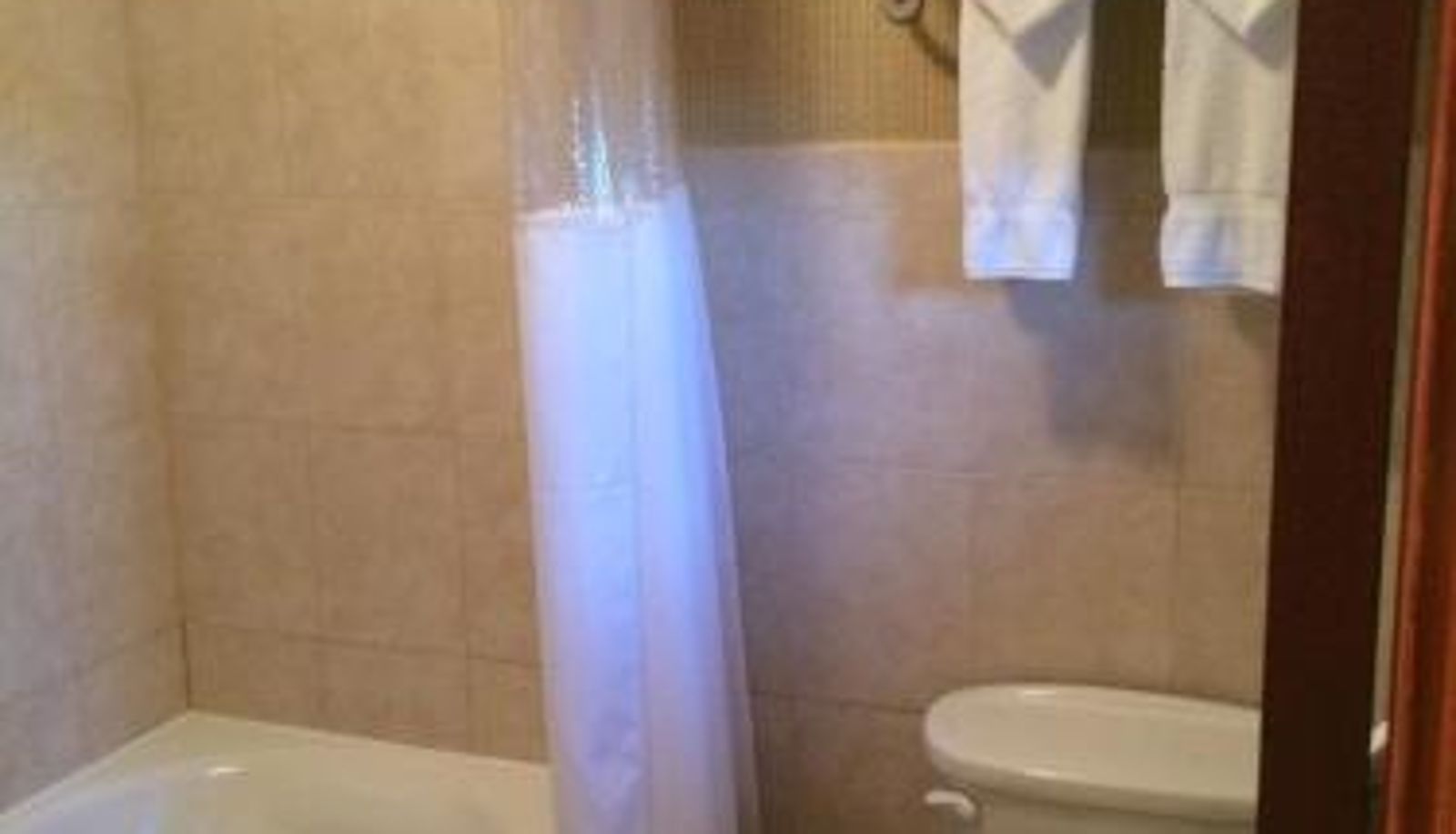 Badezimmer - Pacer Inn & Suites Motel