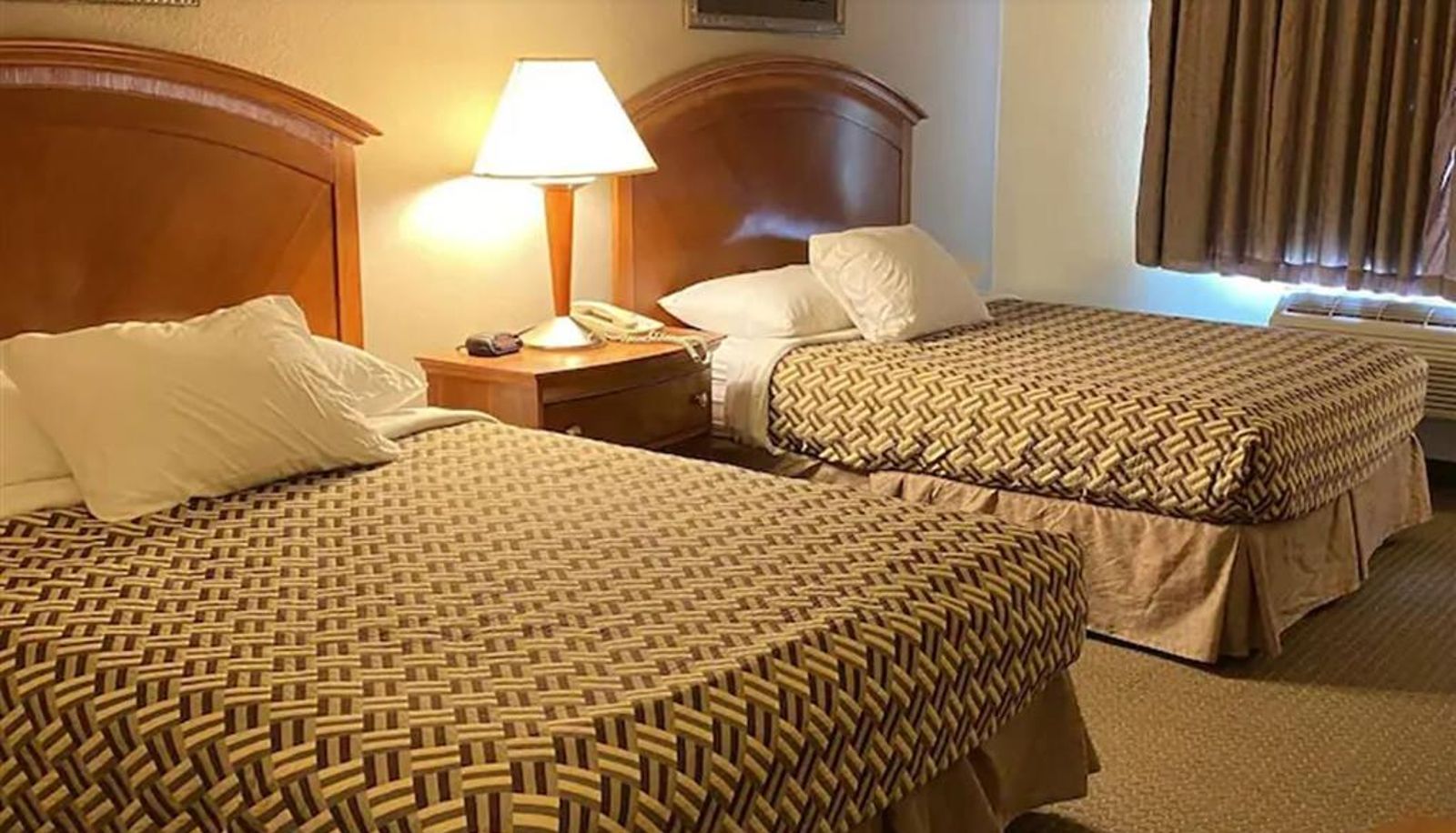 Kamer - A Riverside Inn Travelodge by Wyndham