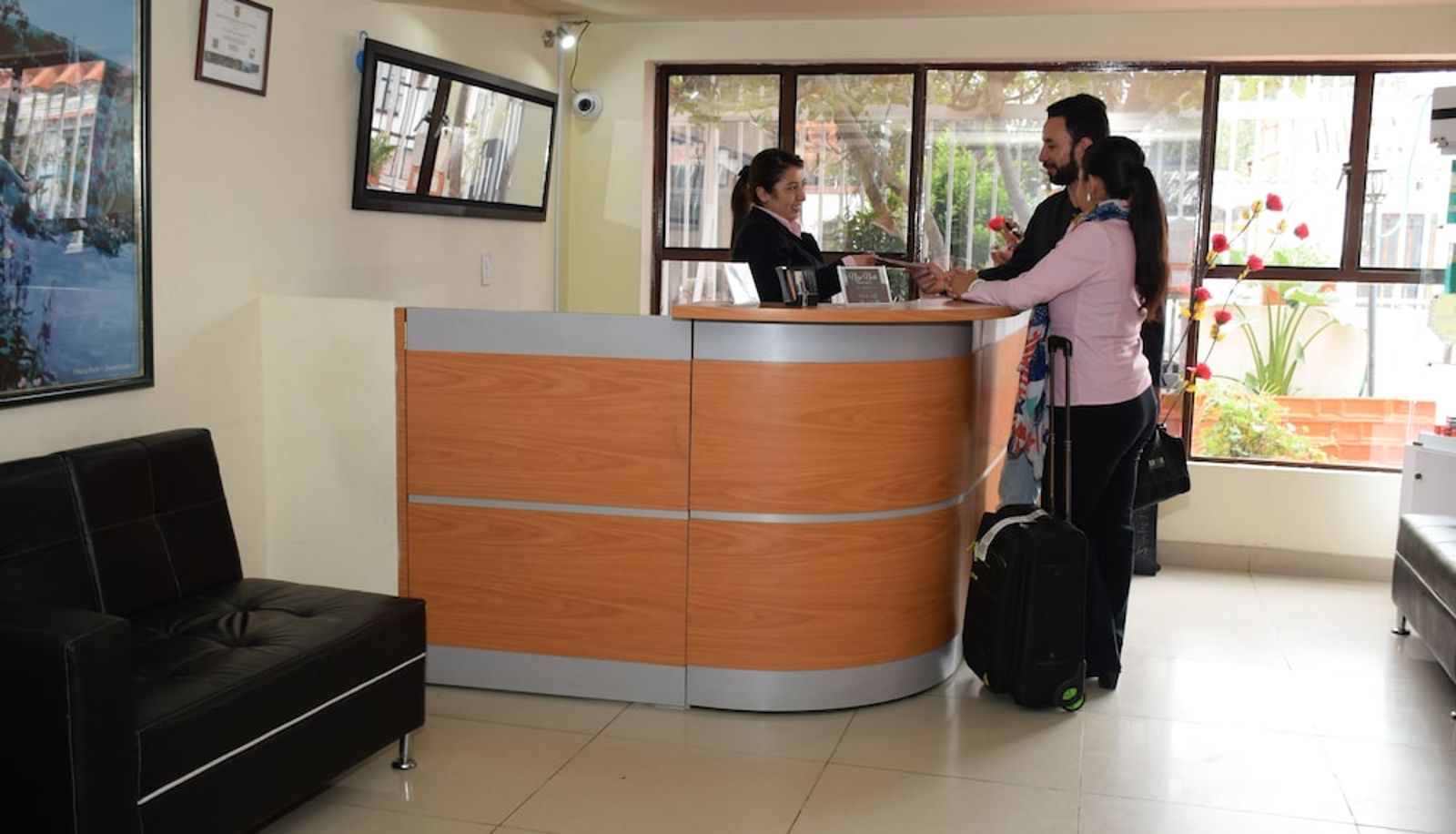 Reception - Niza Norte Apartments and Suites