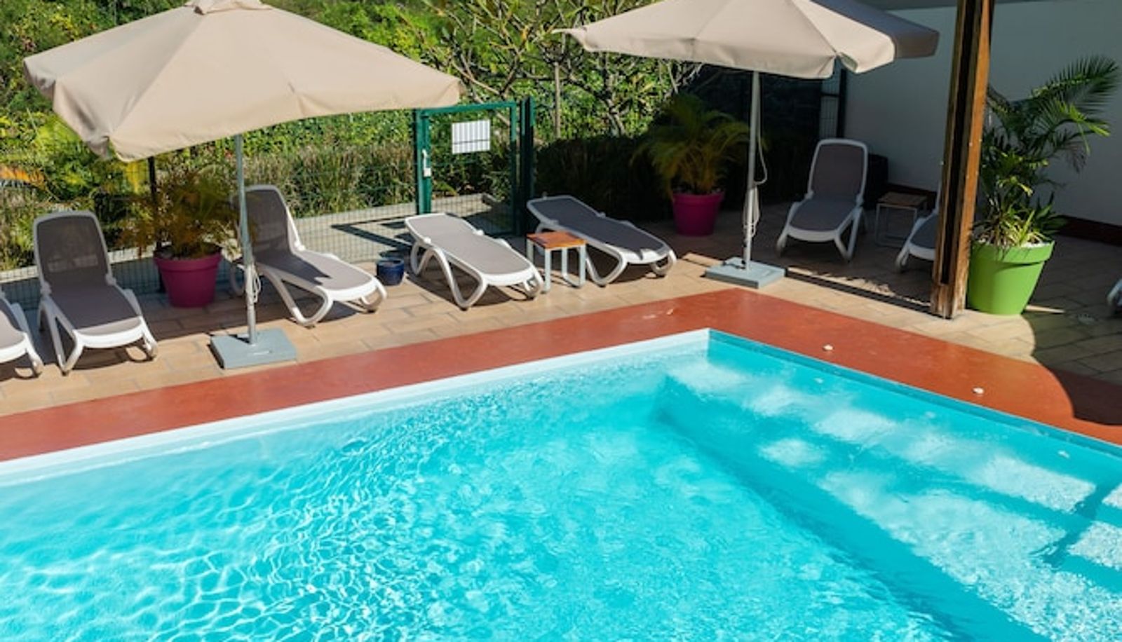 Piscina - TAMA Hôtel