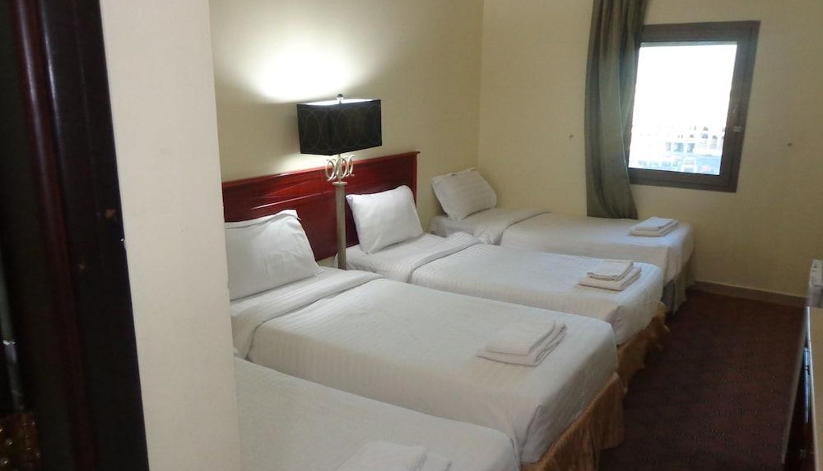 Quadruple room - Ishraq Al Bustan Hotel