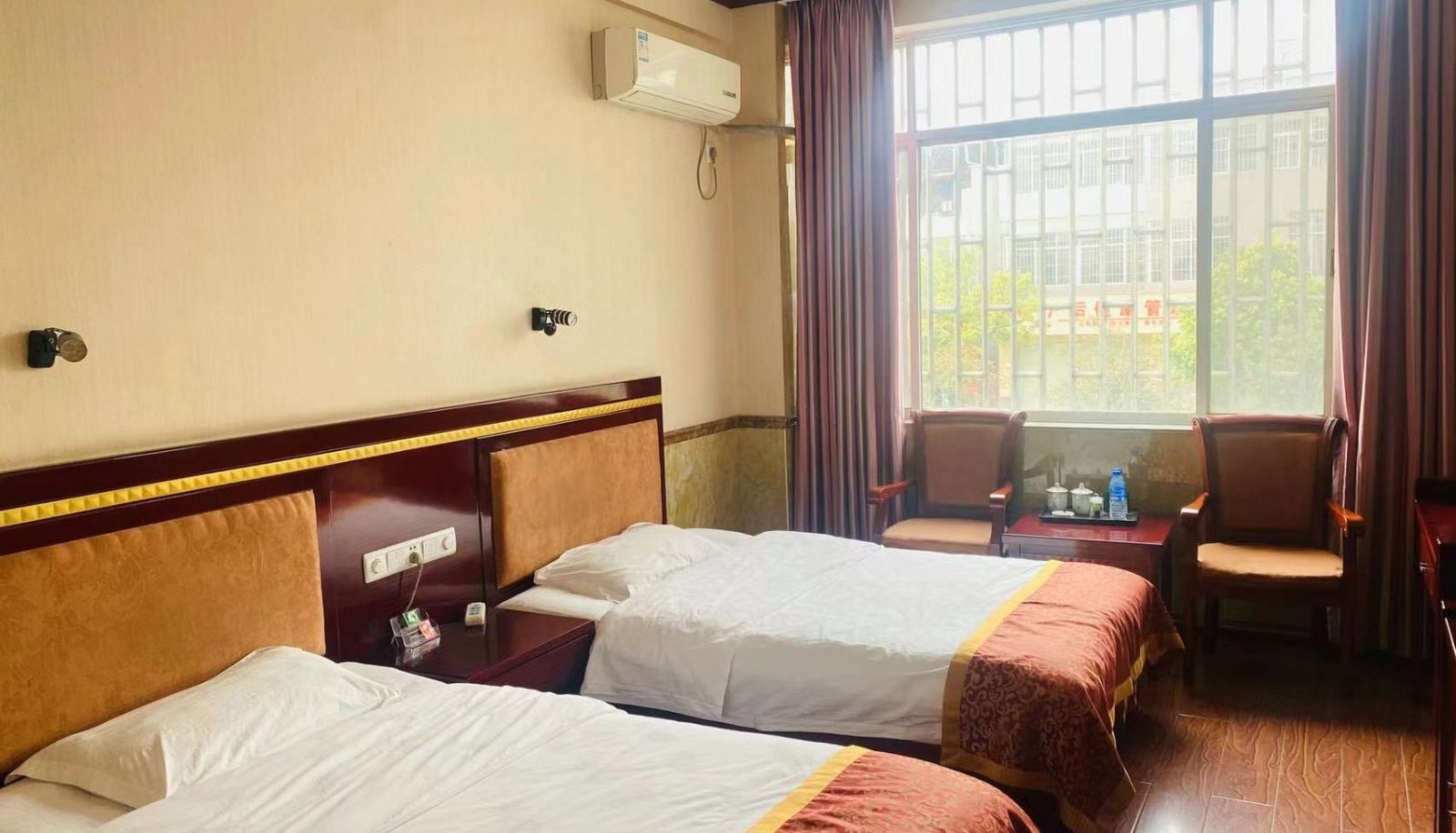 Zimmer - Jinlong Business Hotel