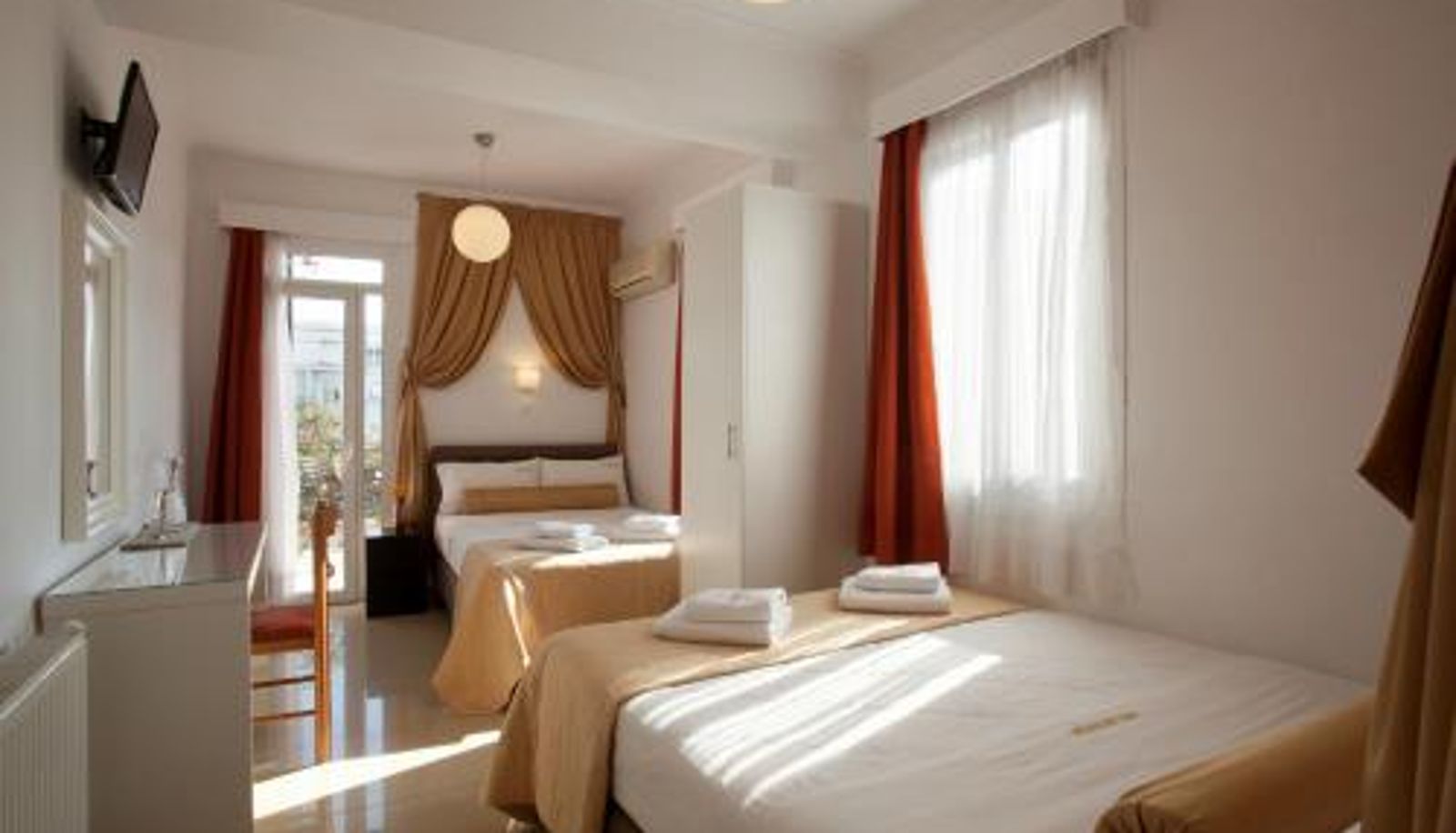 Habitación familiar - Metropolis Hotel Hotel