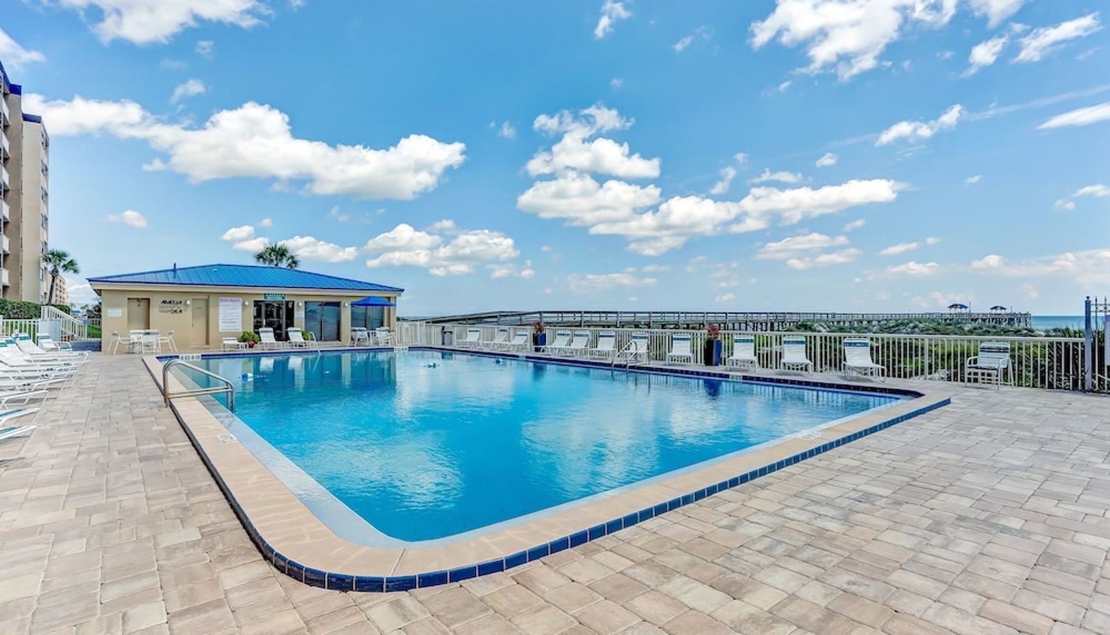 Apartment - North End Corner Unit with View of the Ocean and Miles of Sandy Beach by RedAwning