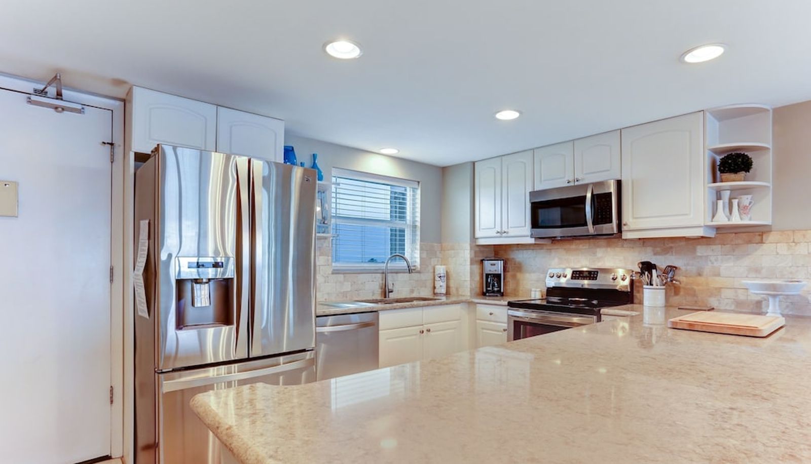 Apartment - North End Corner Unit with View of the Ocean and Miles of Sandy Beach by RedAwning