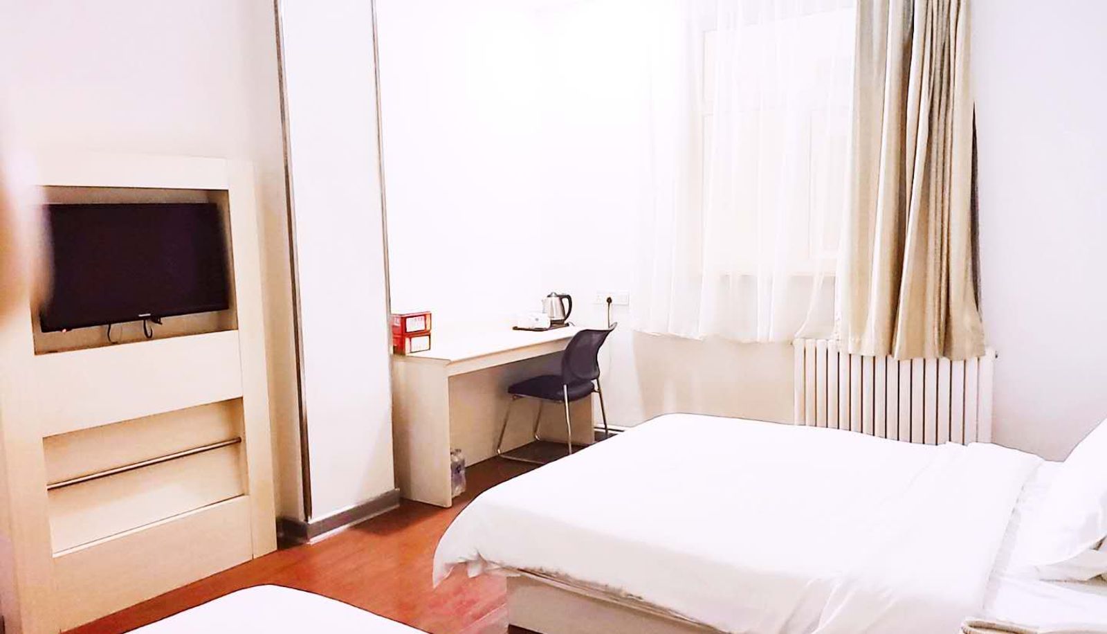 Zimmer - Wanda Plaza Hotel of Hanting Urumqi South Railway Station