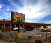 SUNSET INN AND SUIT