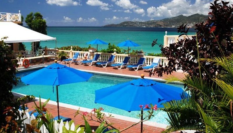 Piscina - Flamboyant Hotel and Cottages