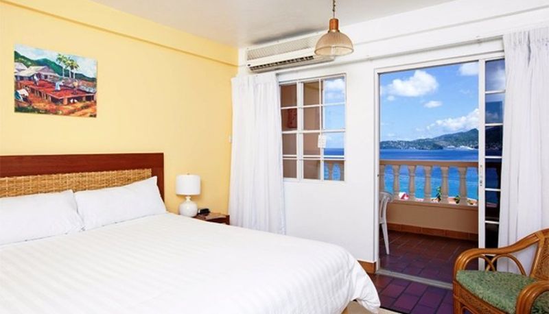 Habitación - Flamboyant Hotel and Cottages