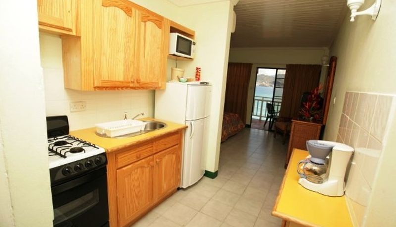 Habitación - Flamboyant Hotel and Cottages